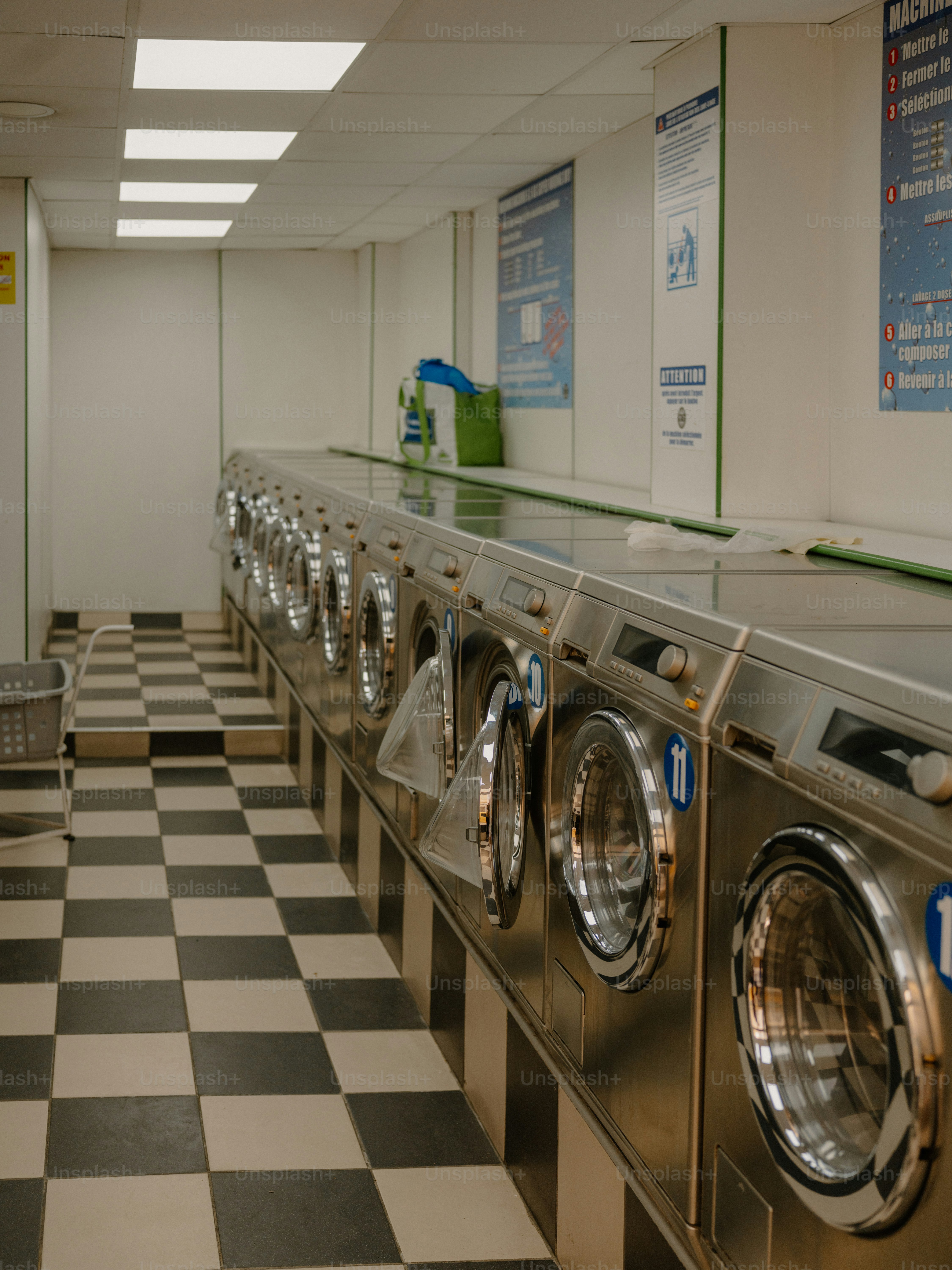 Row of washing machines in a laundromat