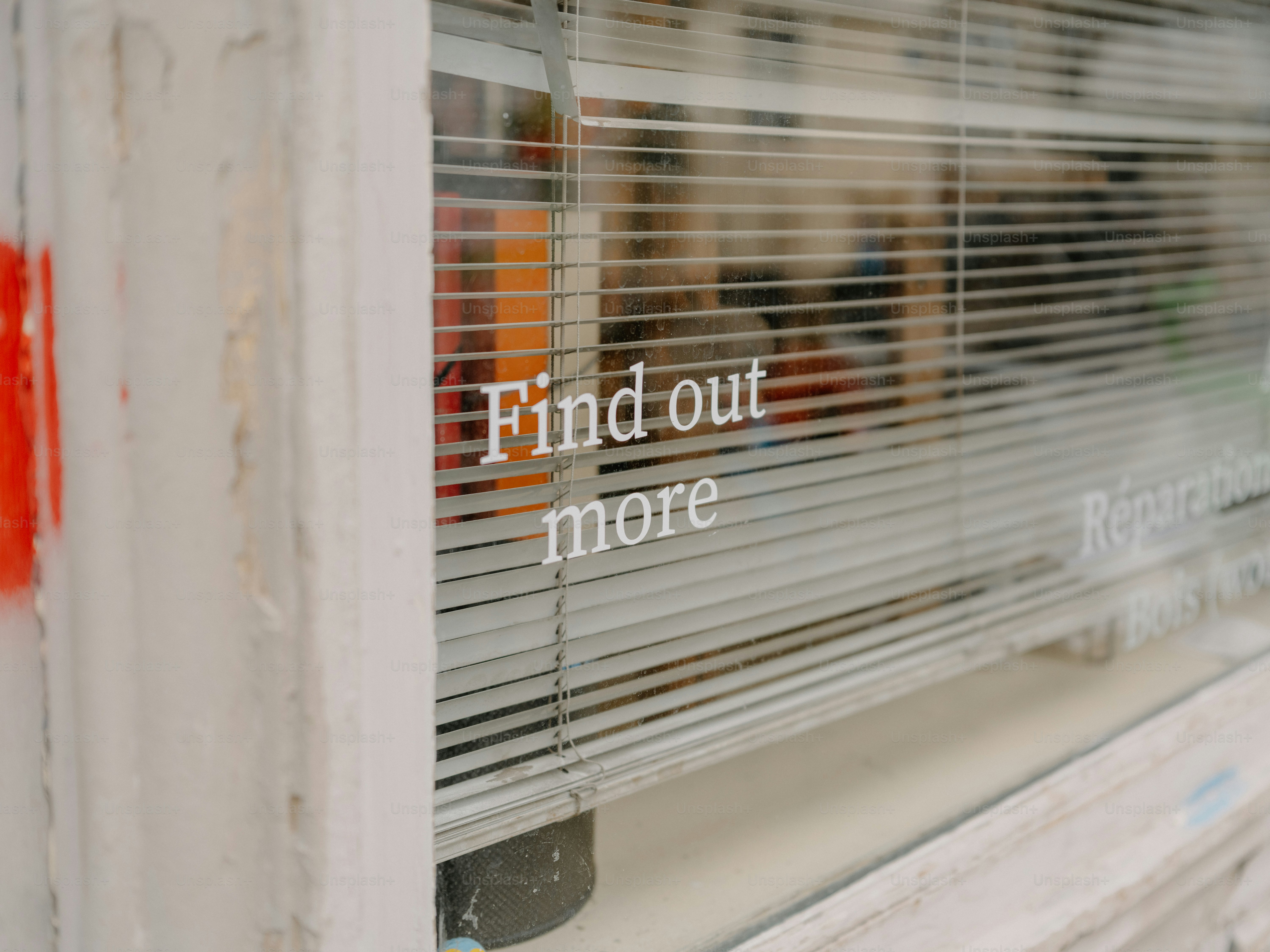 Text on a window reads find out more