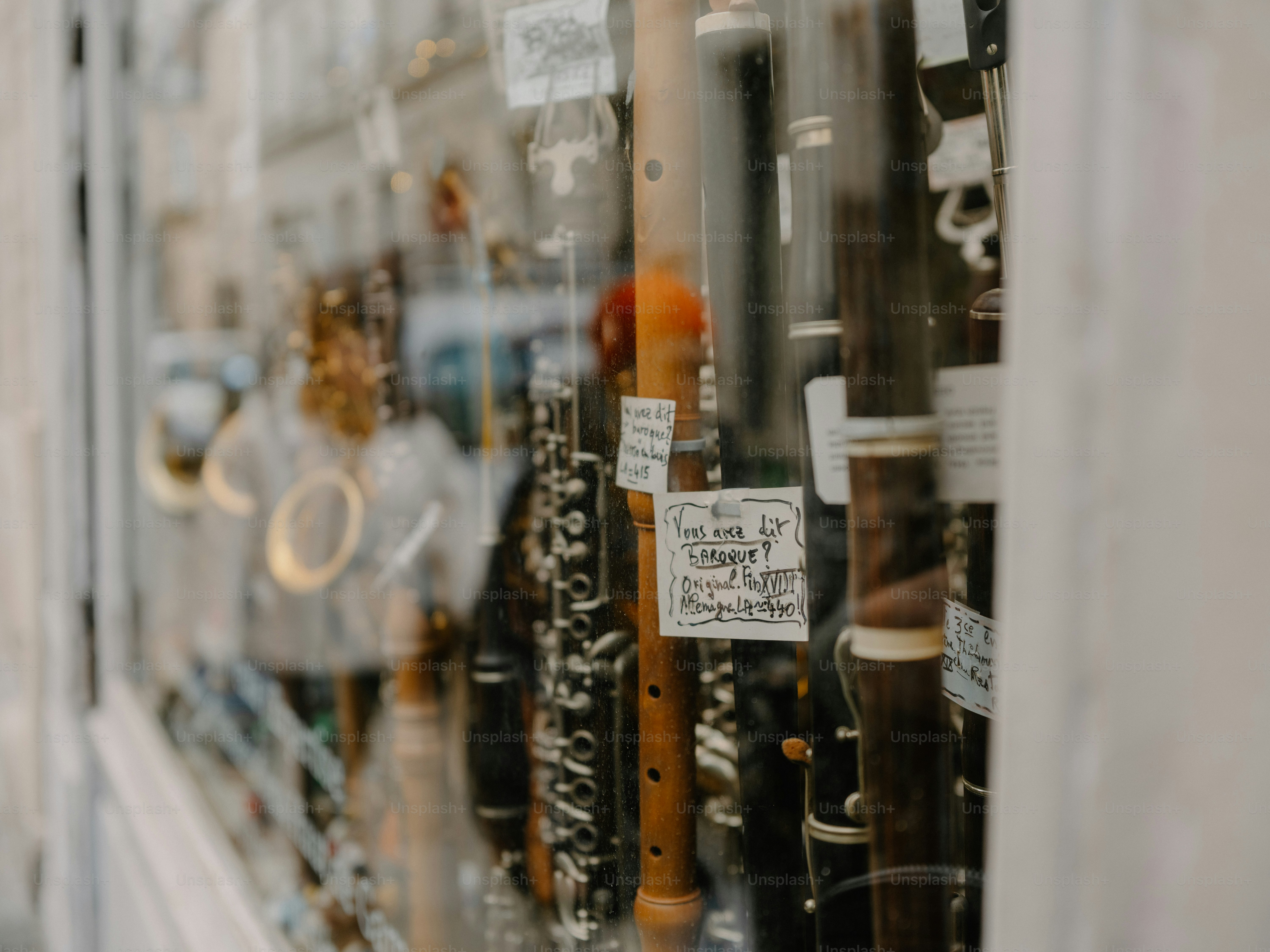 Musical instruments displayed in a shop window photo – Performance ...