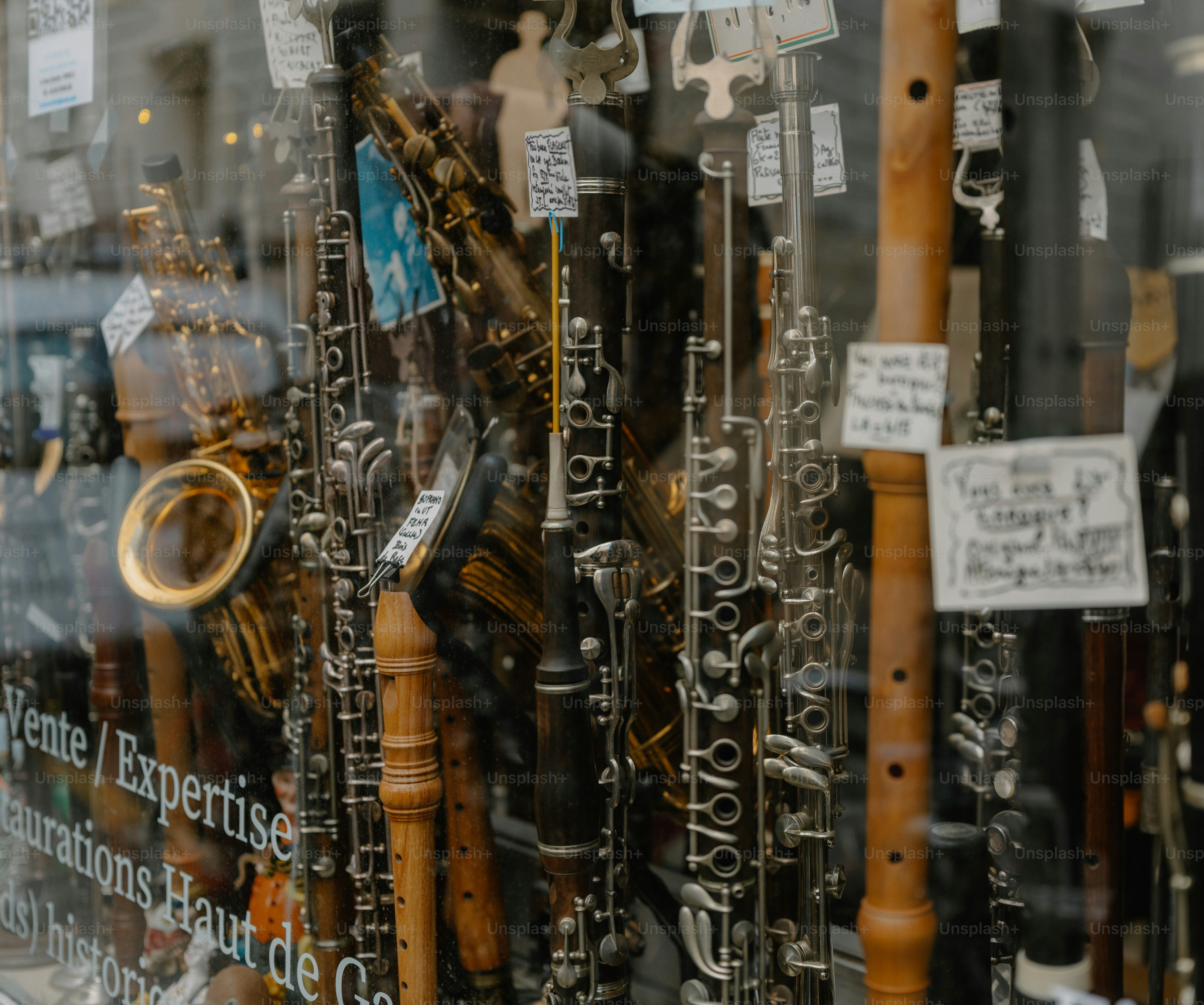 Musical instruments displayed in a shop window photo – Performance ...