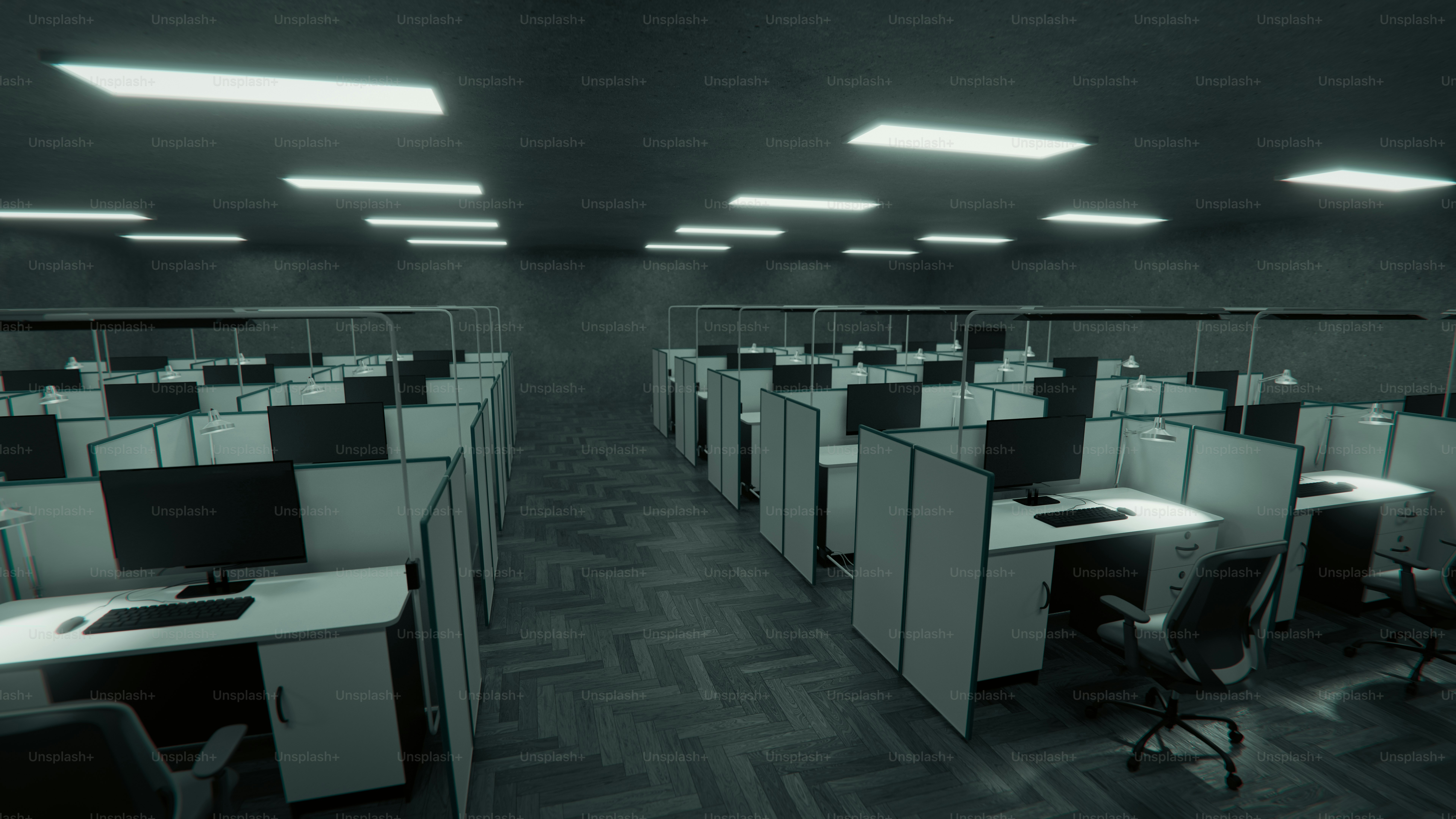 컴퓨터가 가득한 빈 사무실 칸막이들이 줄지어 있었다.