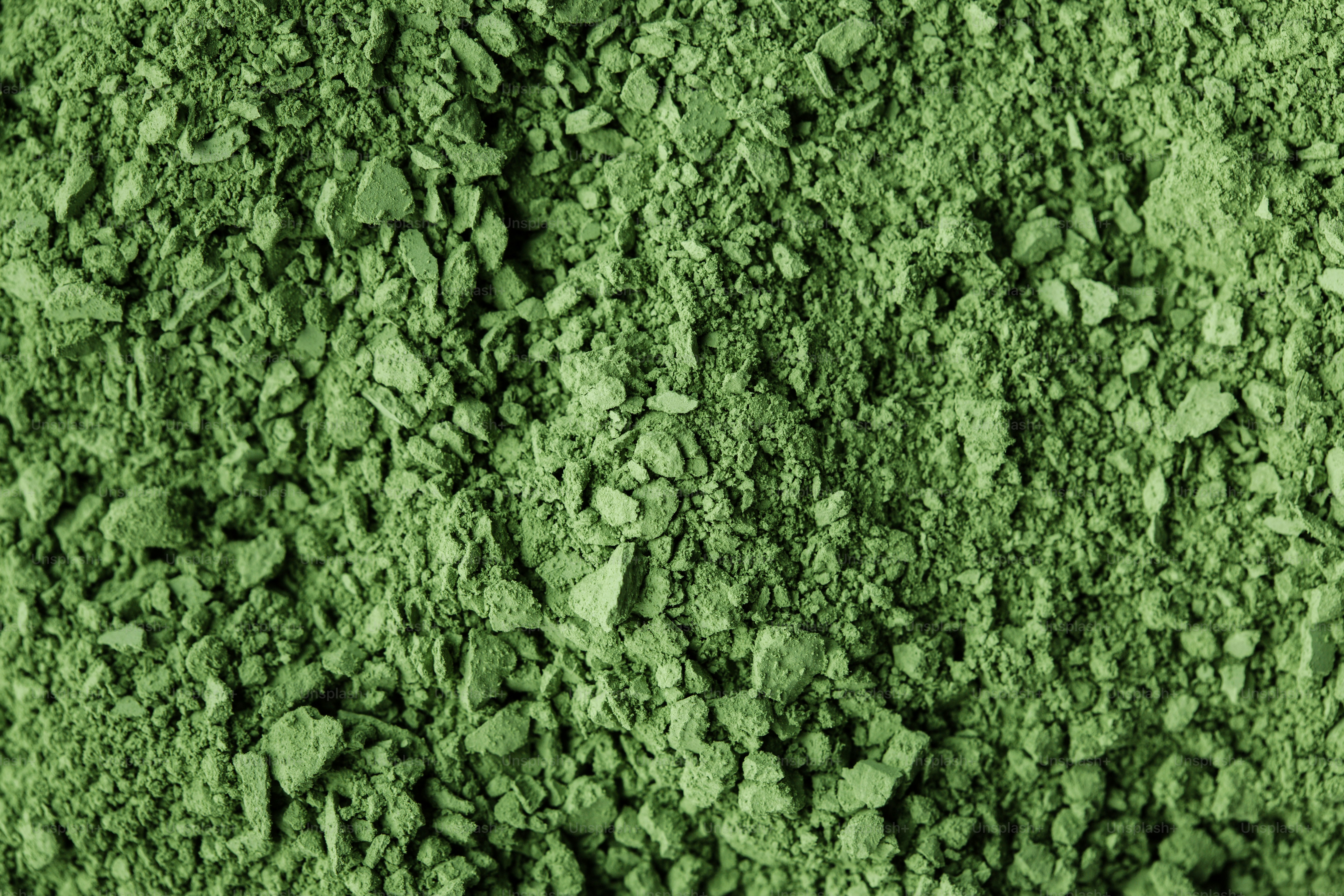 A close-up of a pile of green powder.