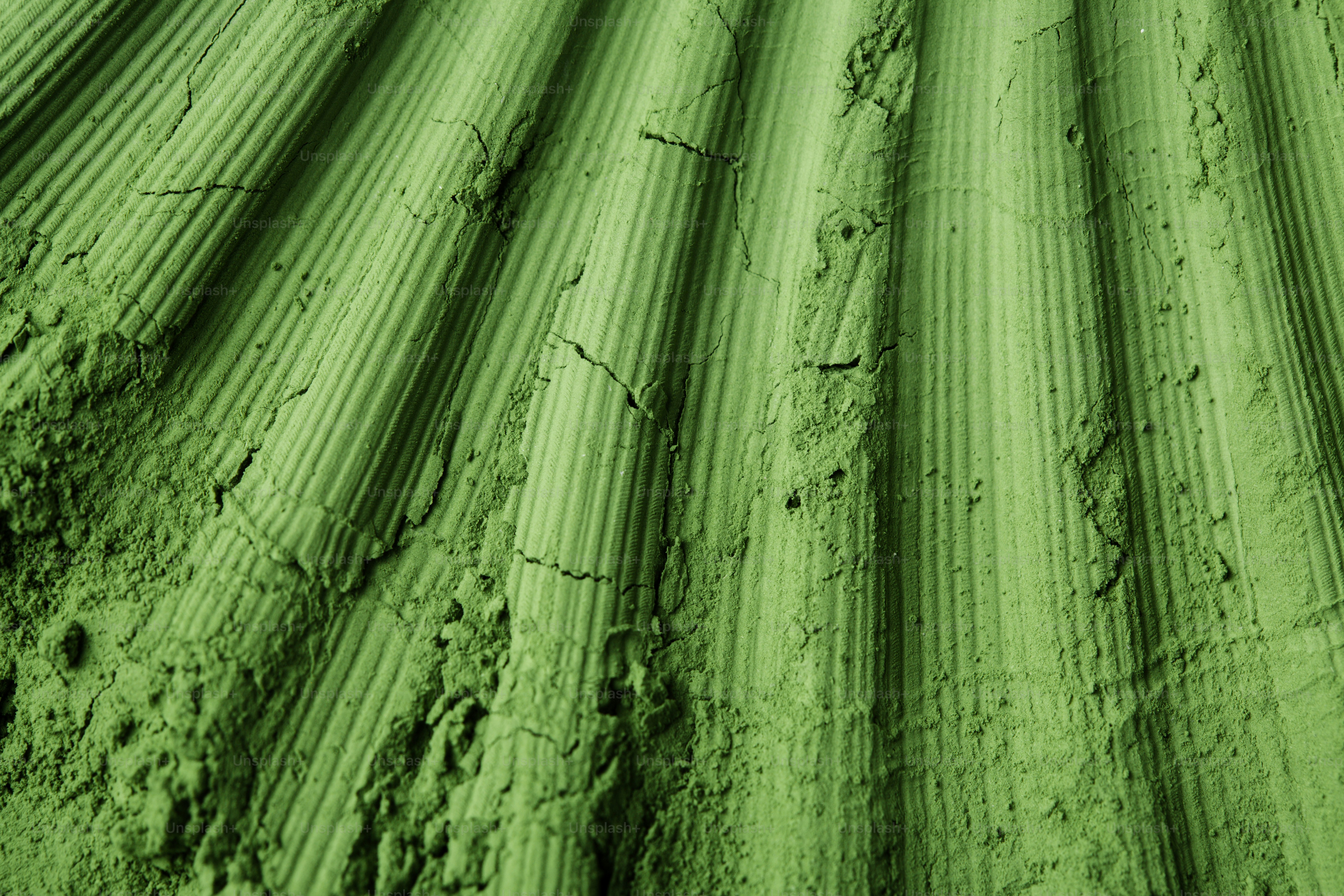 Close-up of a textured green surface with ribbed pattern