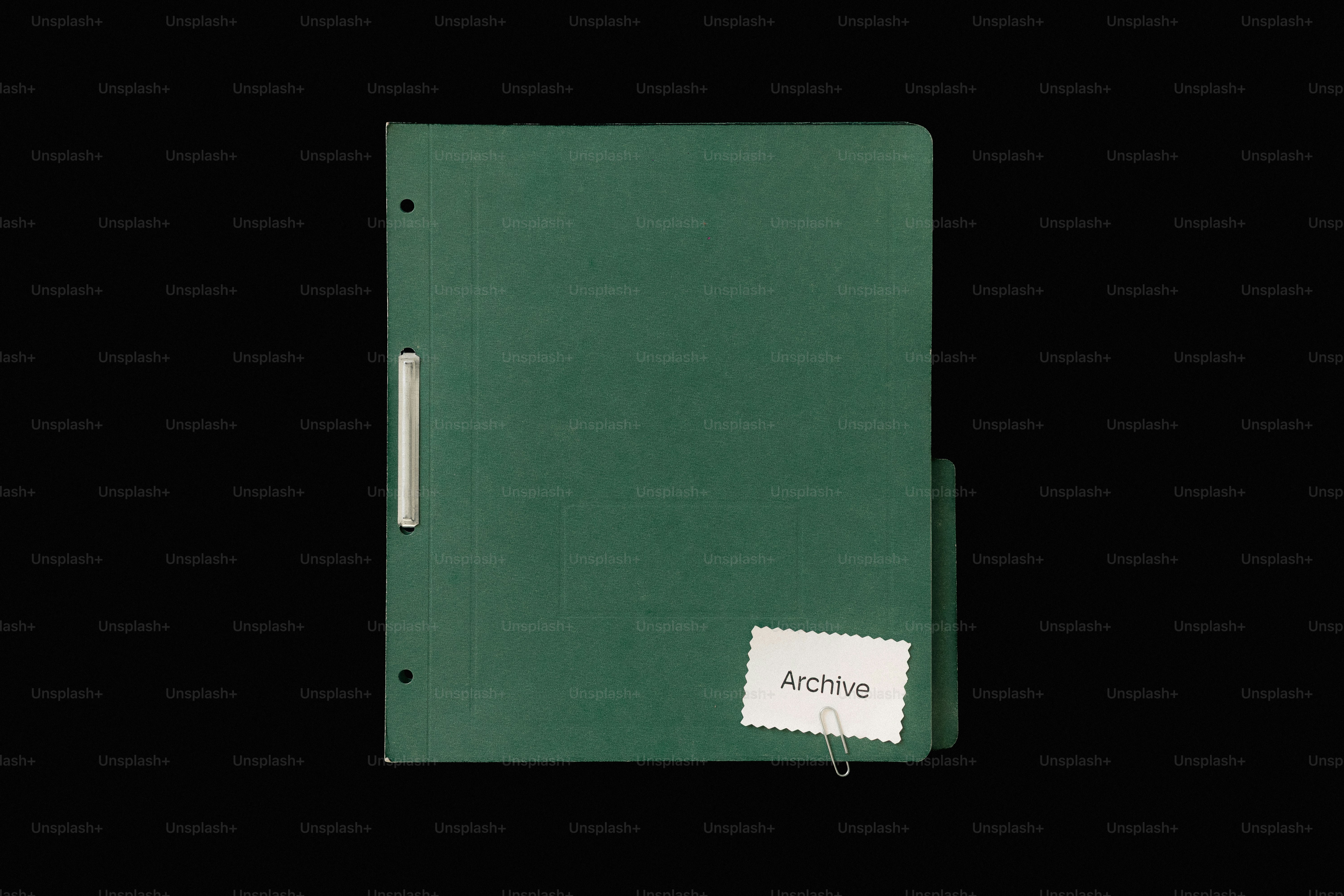 A green folder labeled 