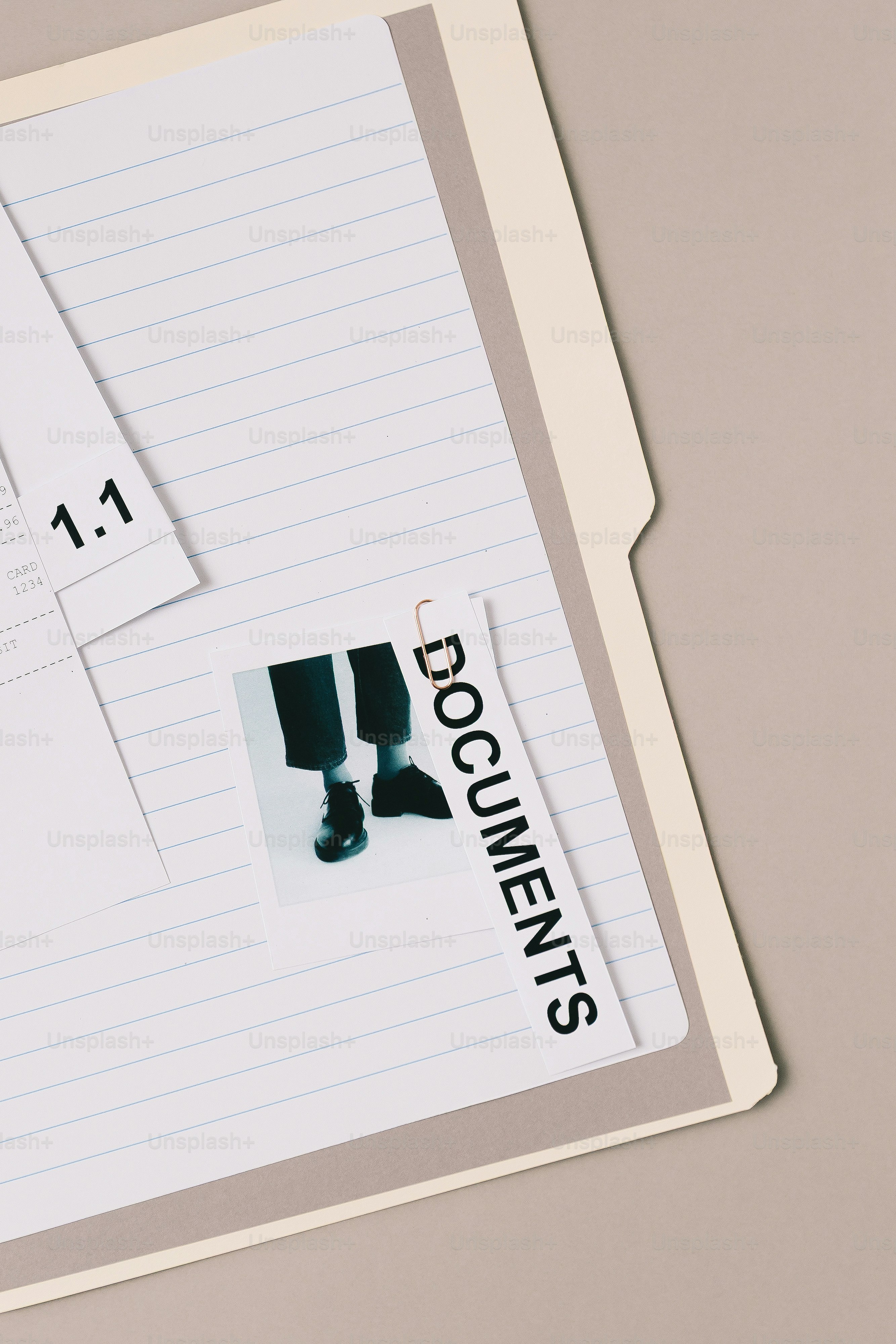 A pile of documents and folders with labels. photo – Business Image on ...