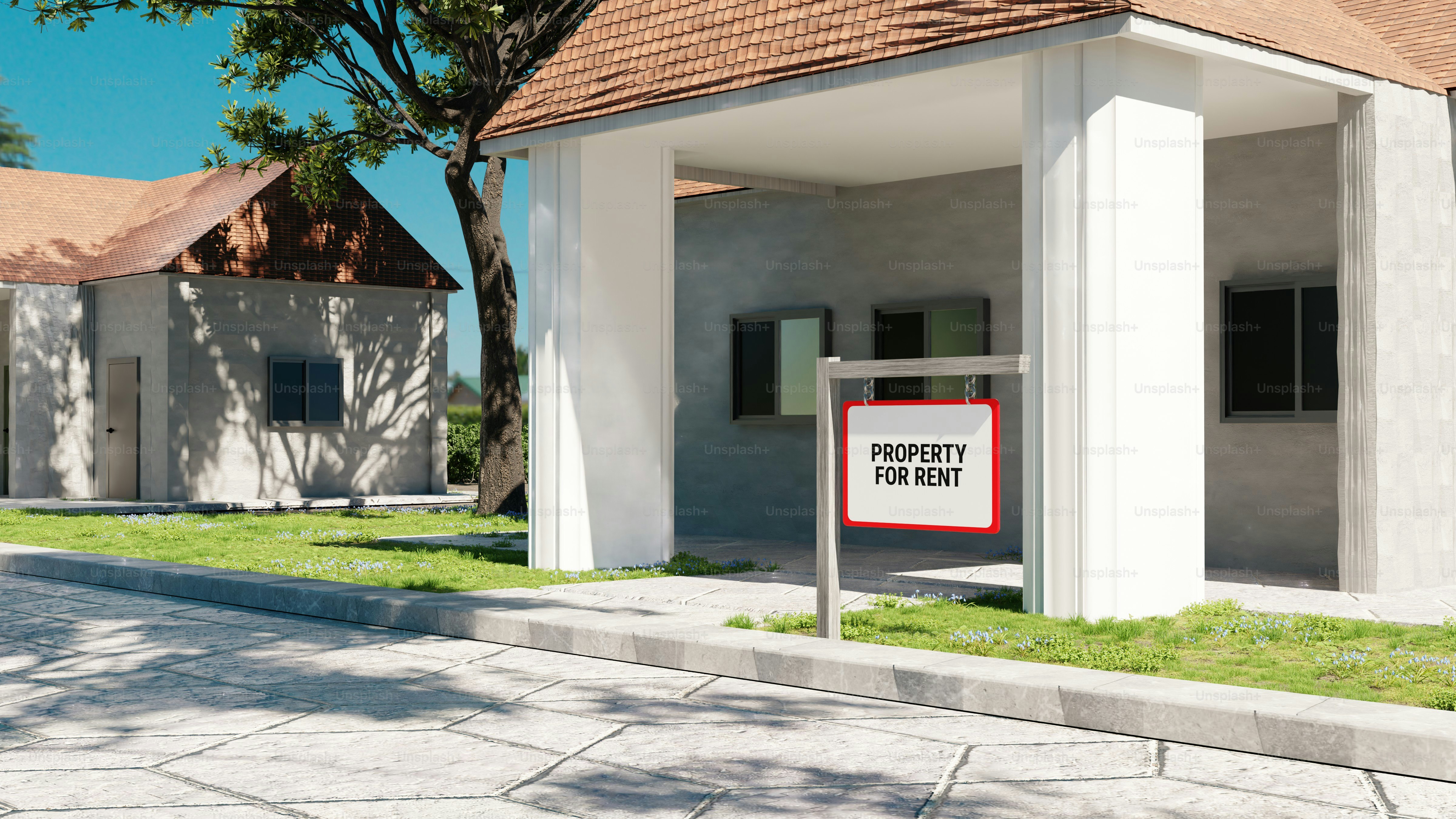 Un panneau « propriété à louer » se trouve devant un bâtiment.