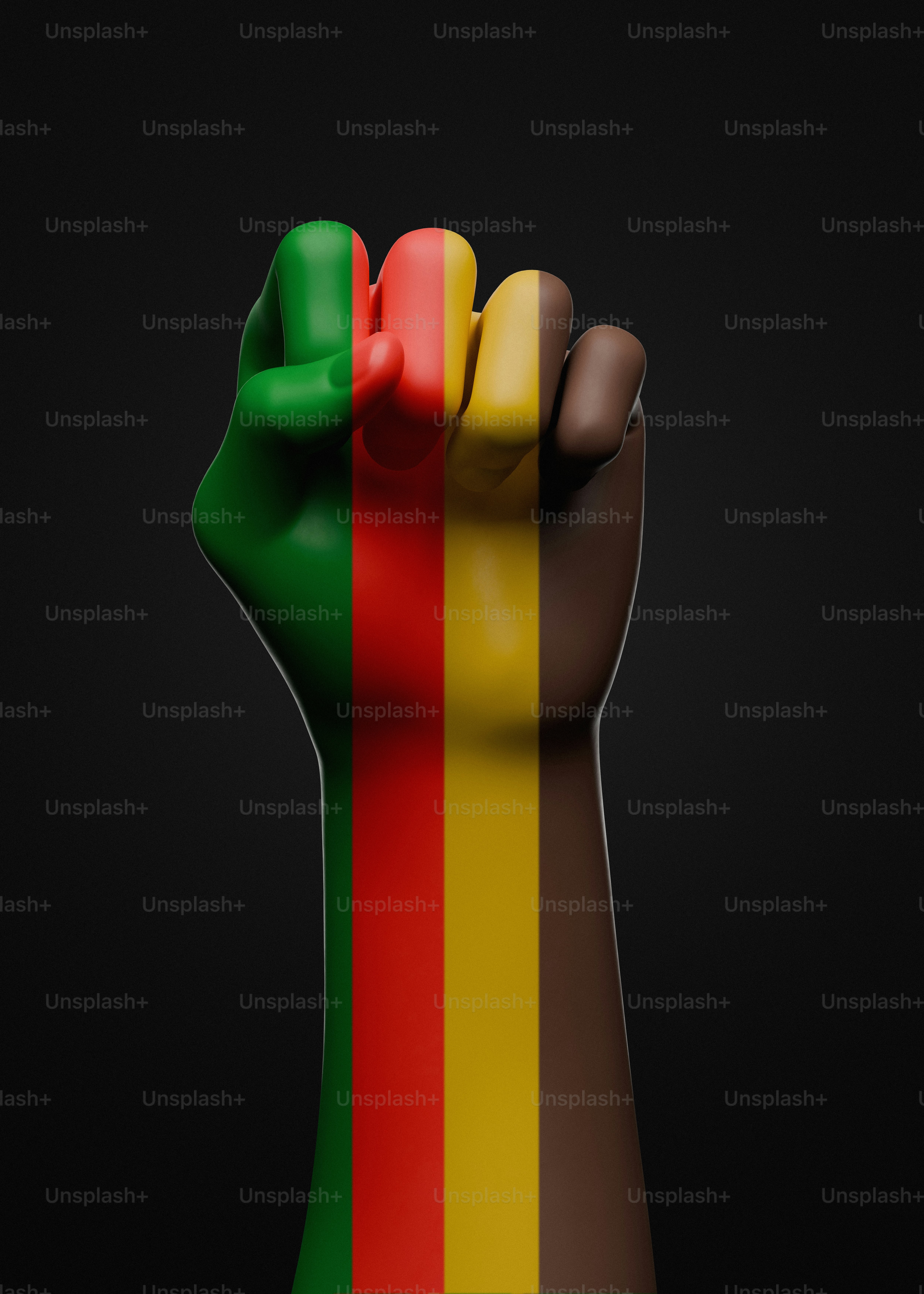 Punho pintado com as cores da bandeira pan-africana erguidas.