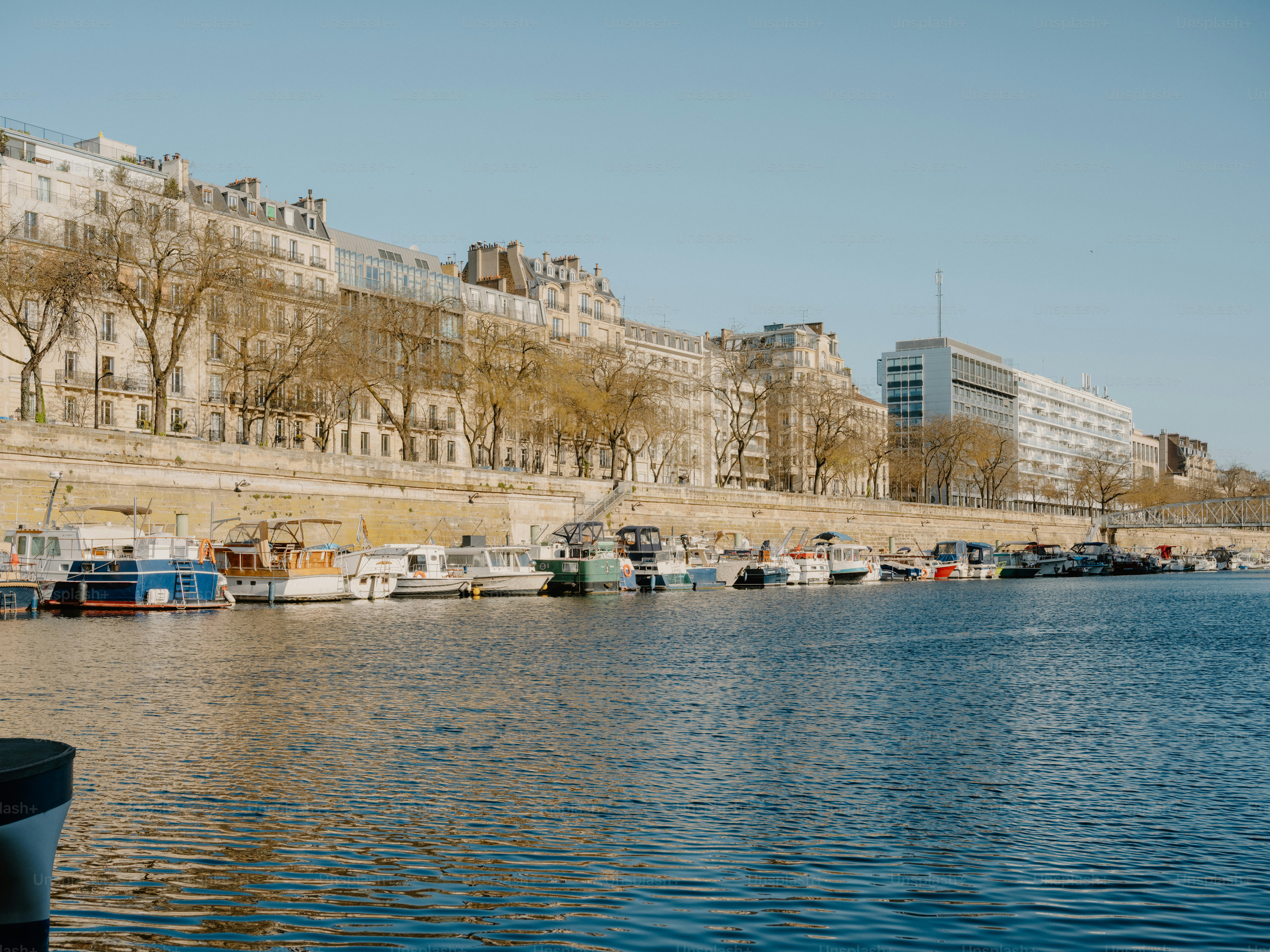 Boats docked along the seine river in paris