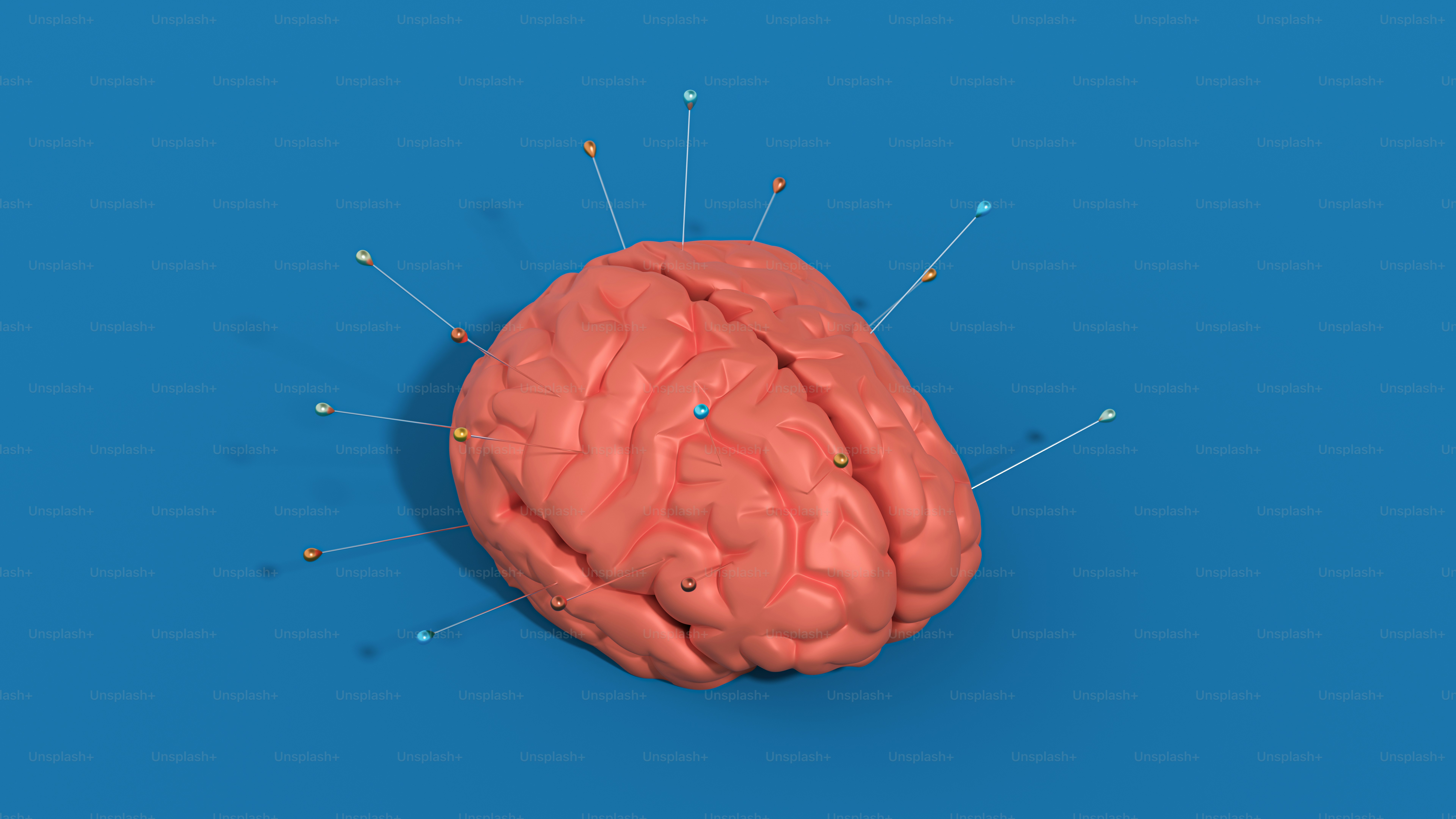 A pink brain with pins on a blue background.