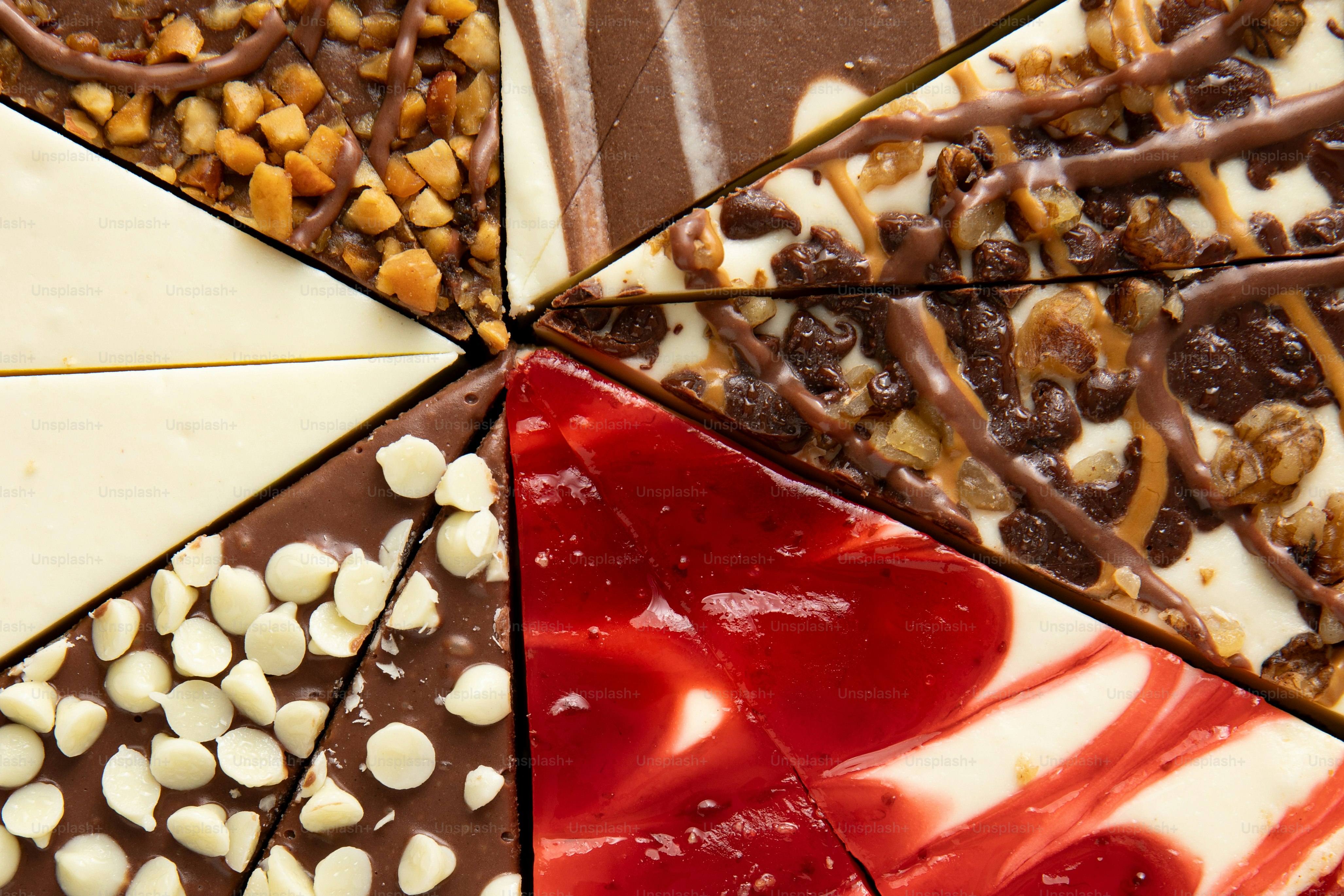 Assortment of triangular dessert slices with various toppings