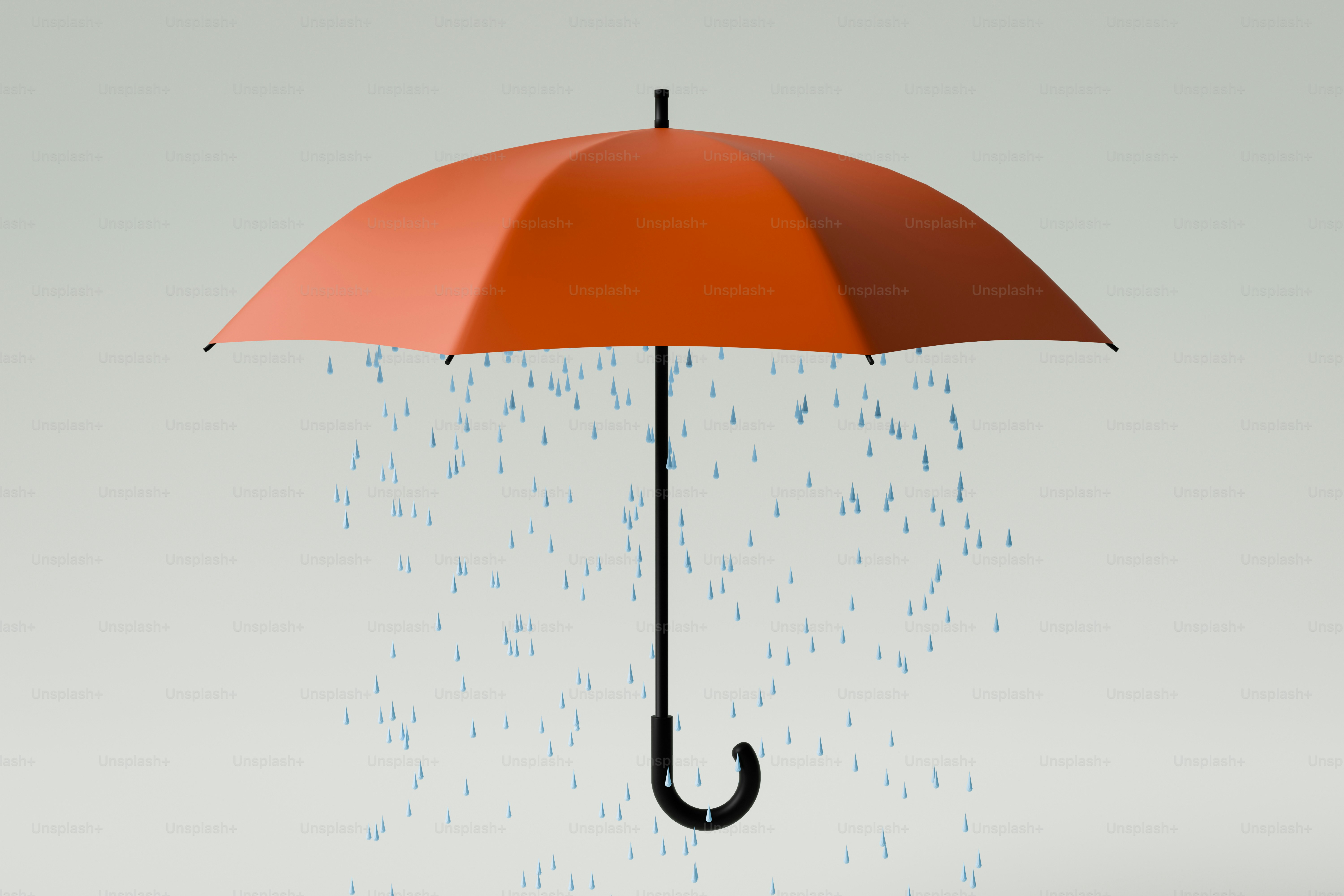 Un paraguas naranja protegiendo de la lluvia