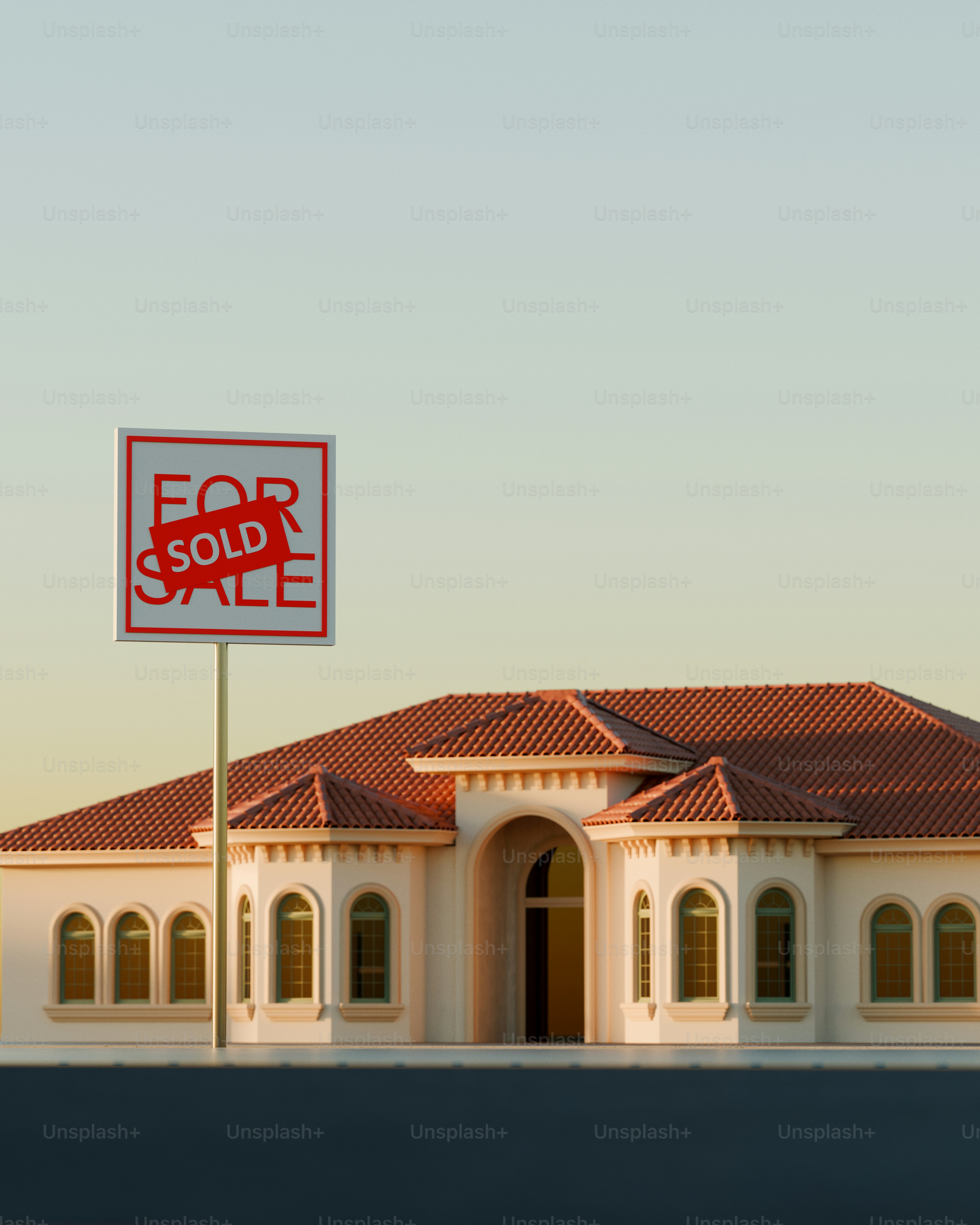 Sebuah rumah dengan tanda terjual di depan.
