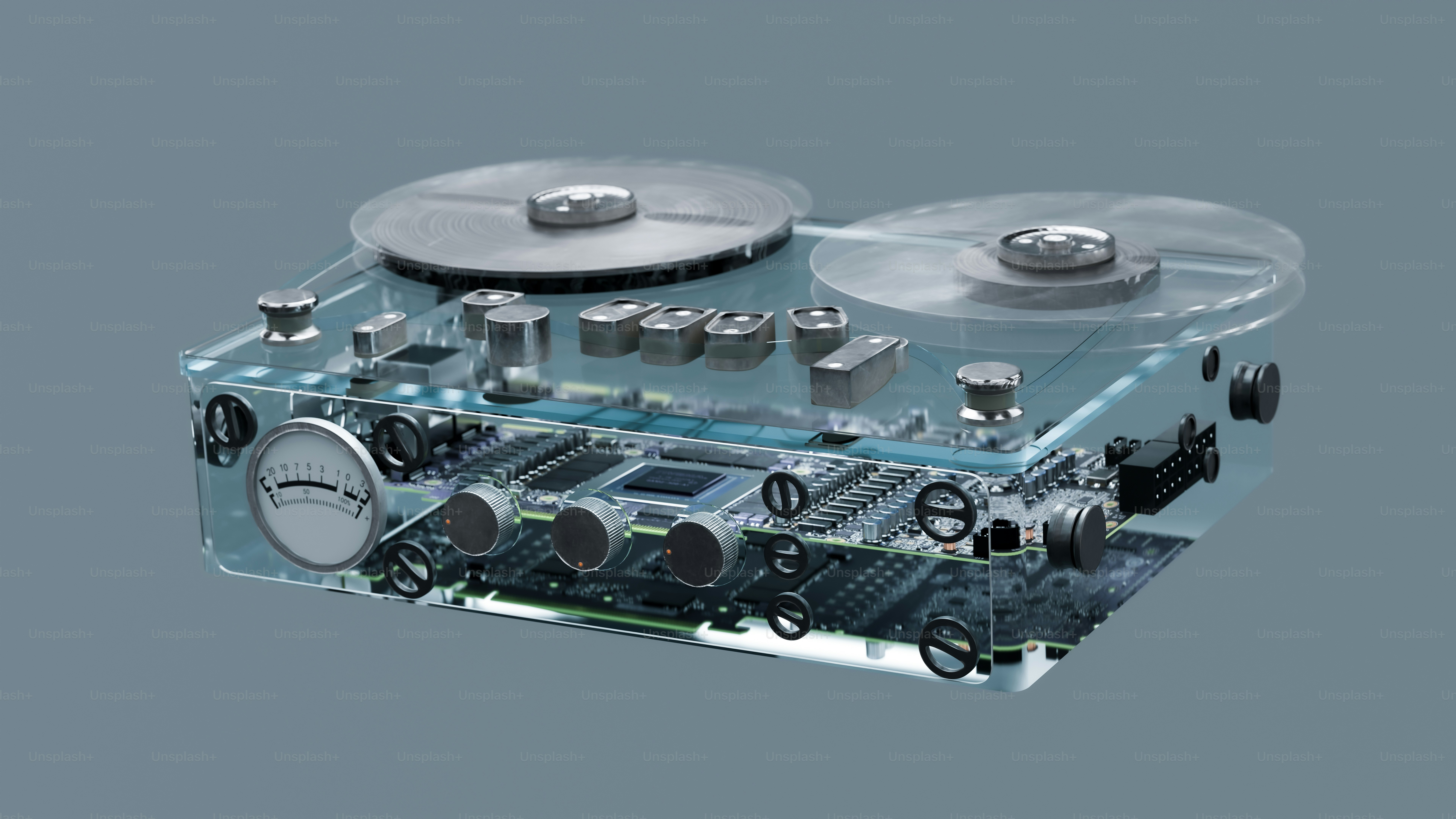 Transparent reel-to-reel tape recorder with visible circuitry