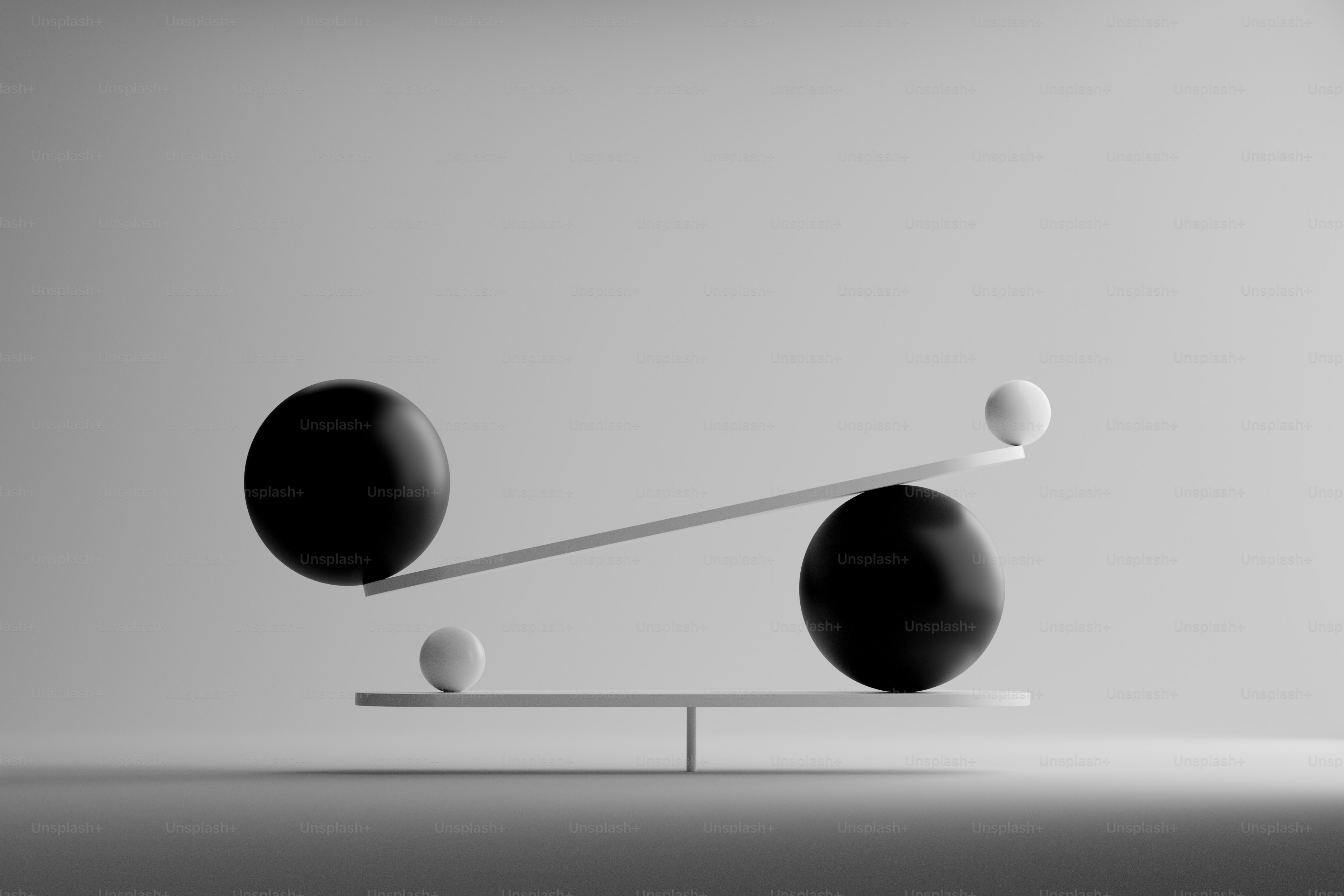 Bola hitam dan putih pada skala penyeimbang