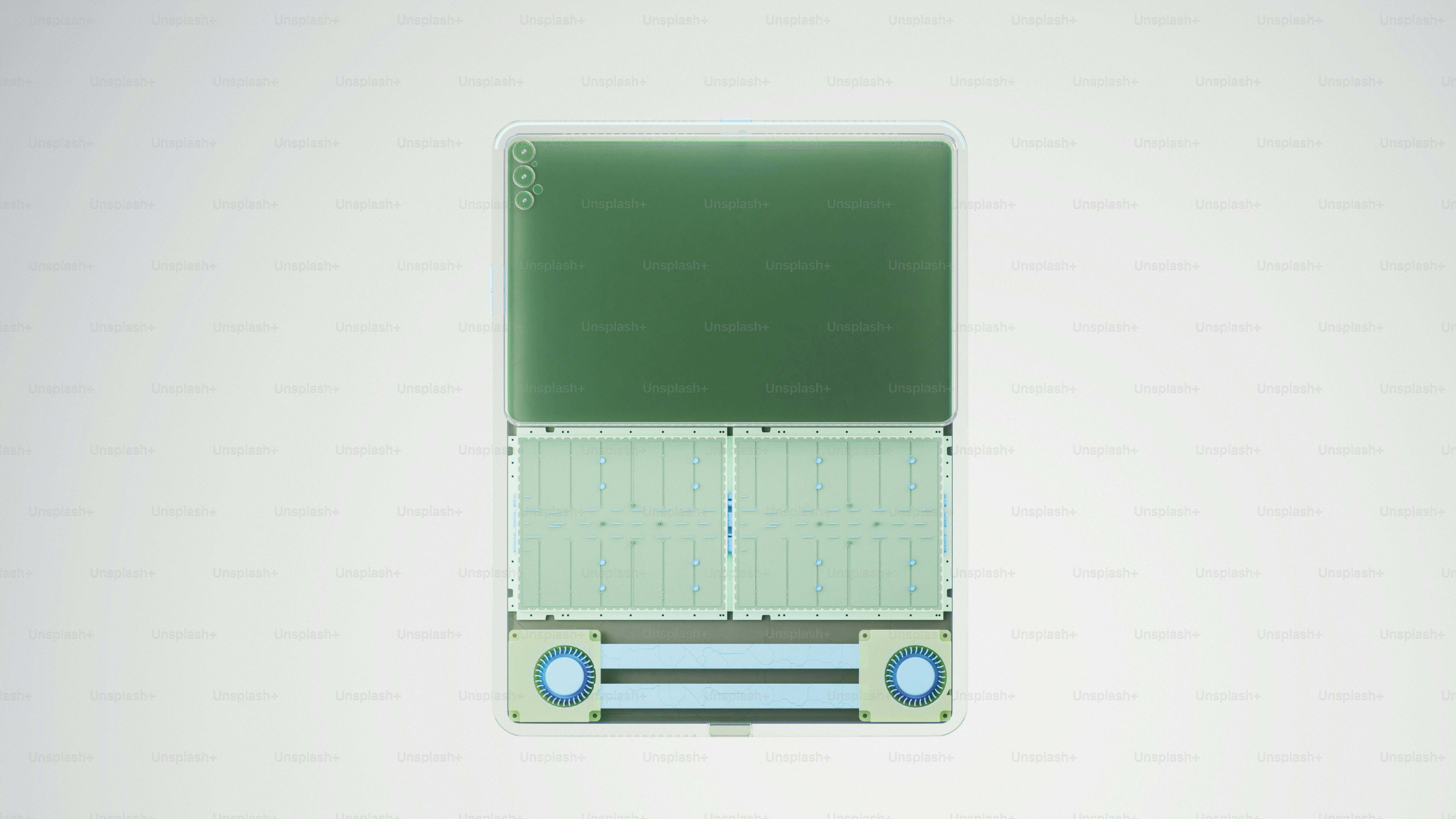 Un computer retrò verde e argento su sfondo bianco