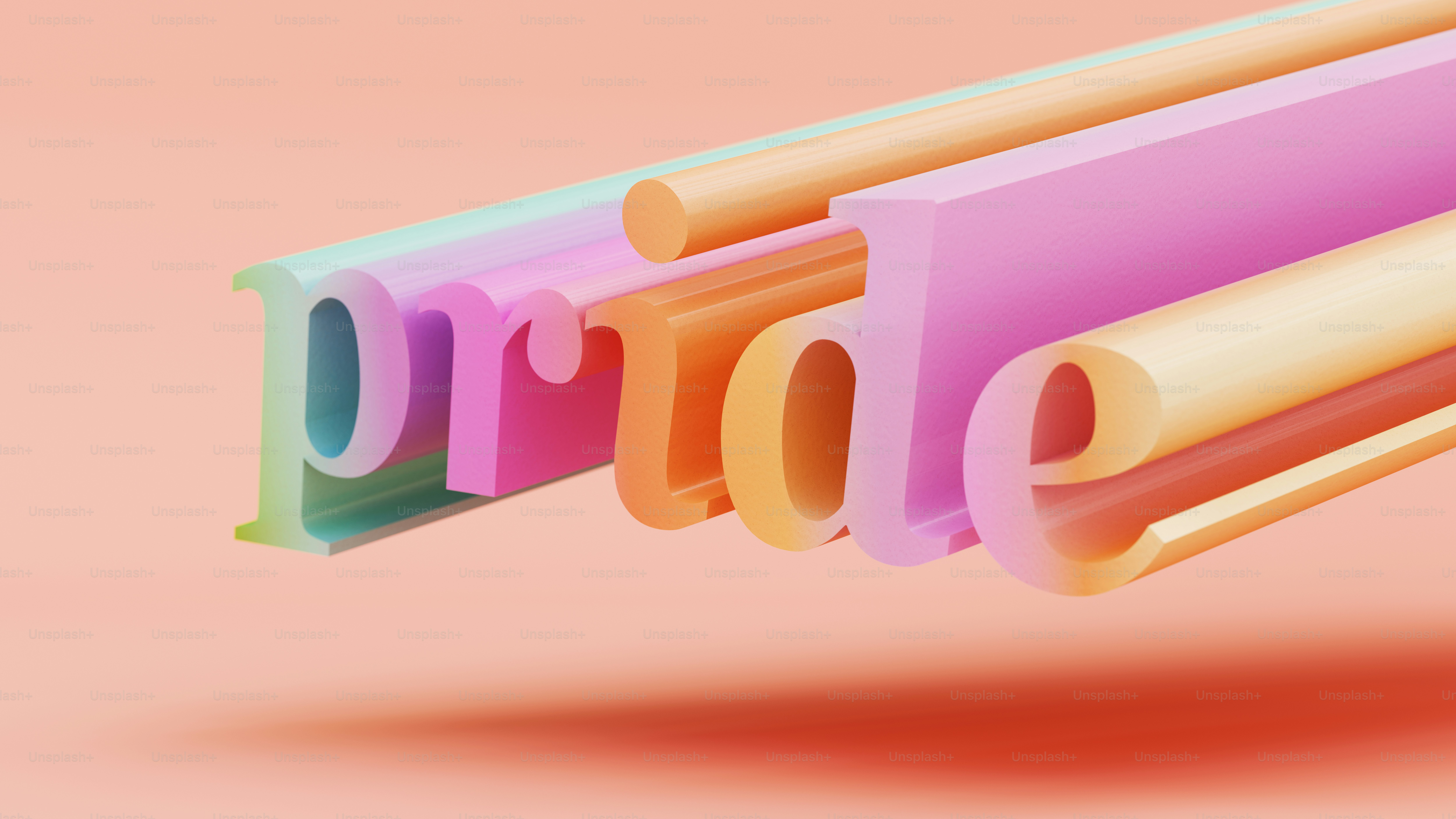 Lettere colorate in 3D formano la parola orgoglio.