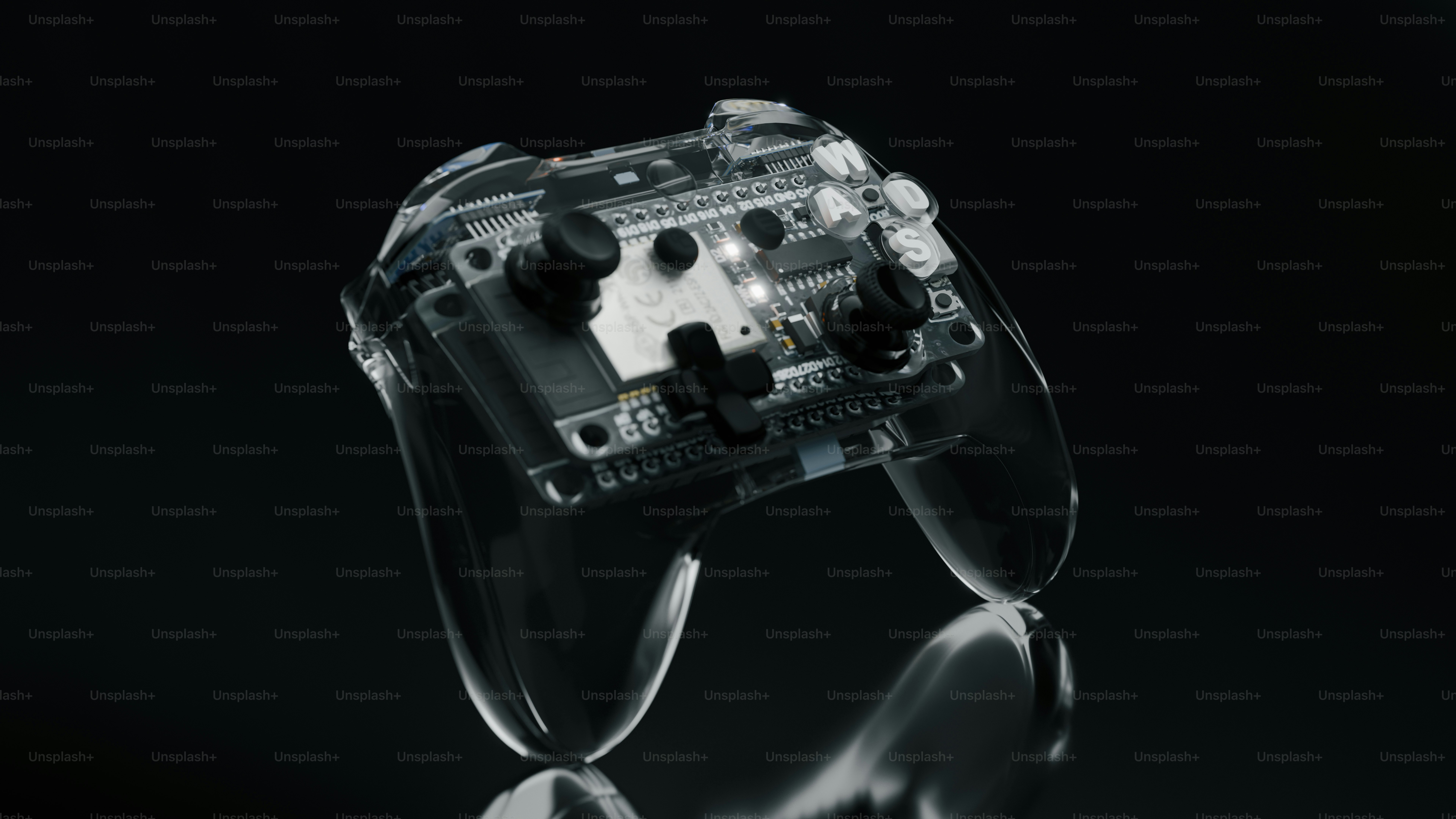 Transparent video game controller on a reflective surface.