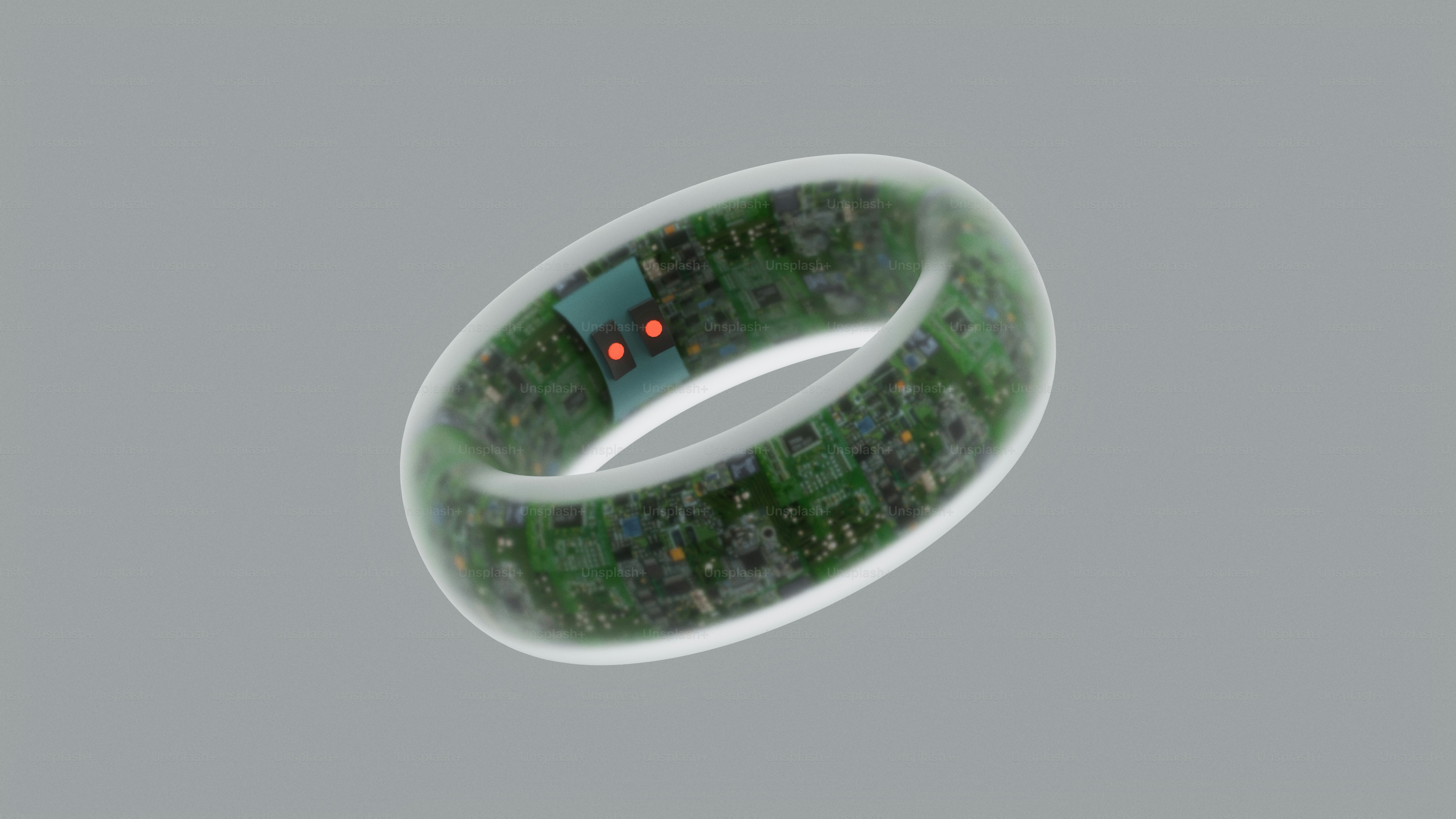 A transparent ring filled with circuit board components.