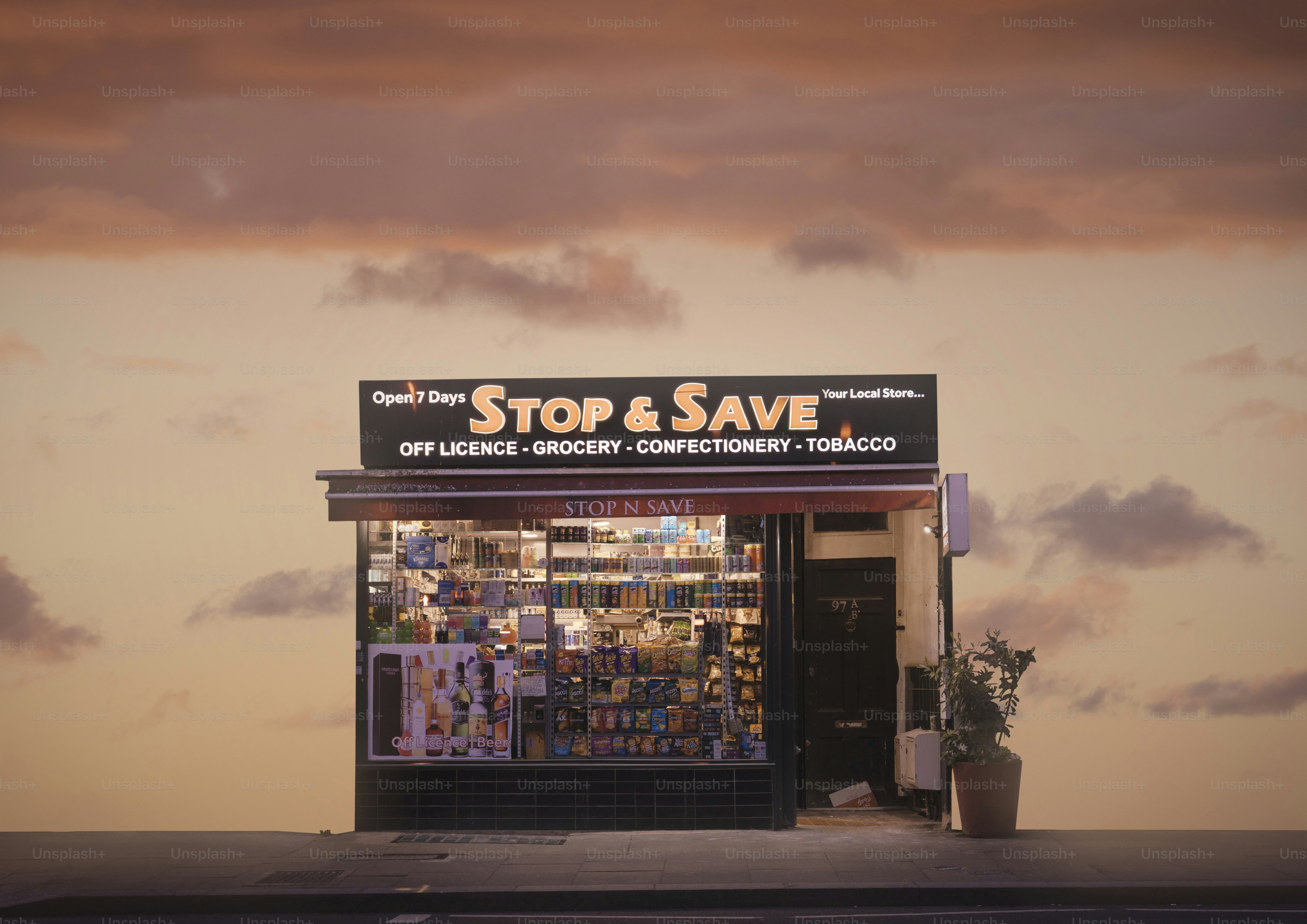Corner store at sunset with warm sky
