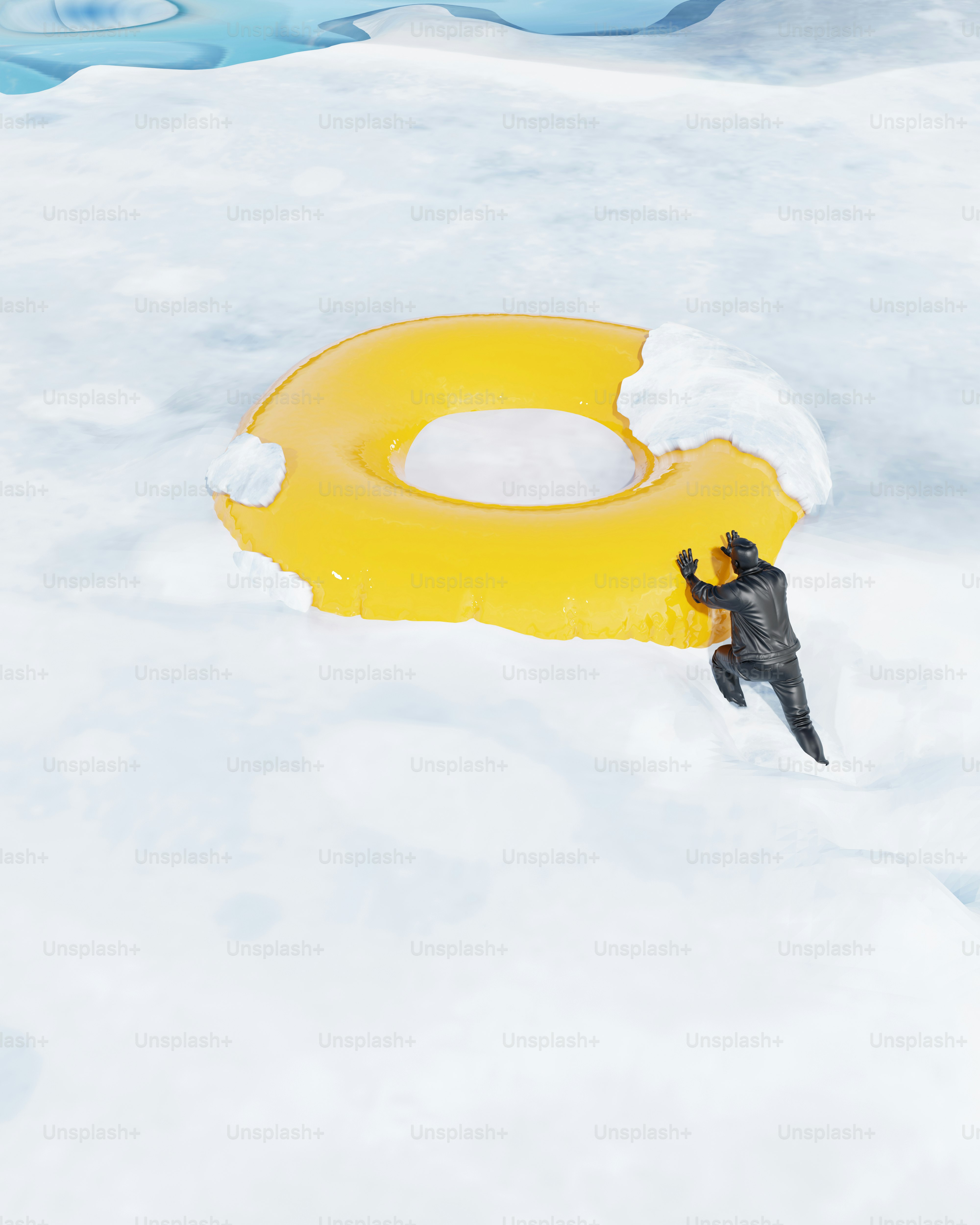 Man climbing yellow ring in snowy landscape
