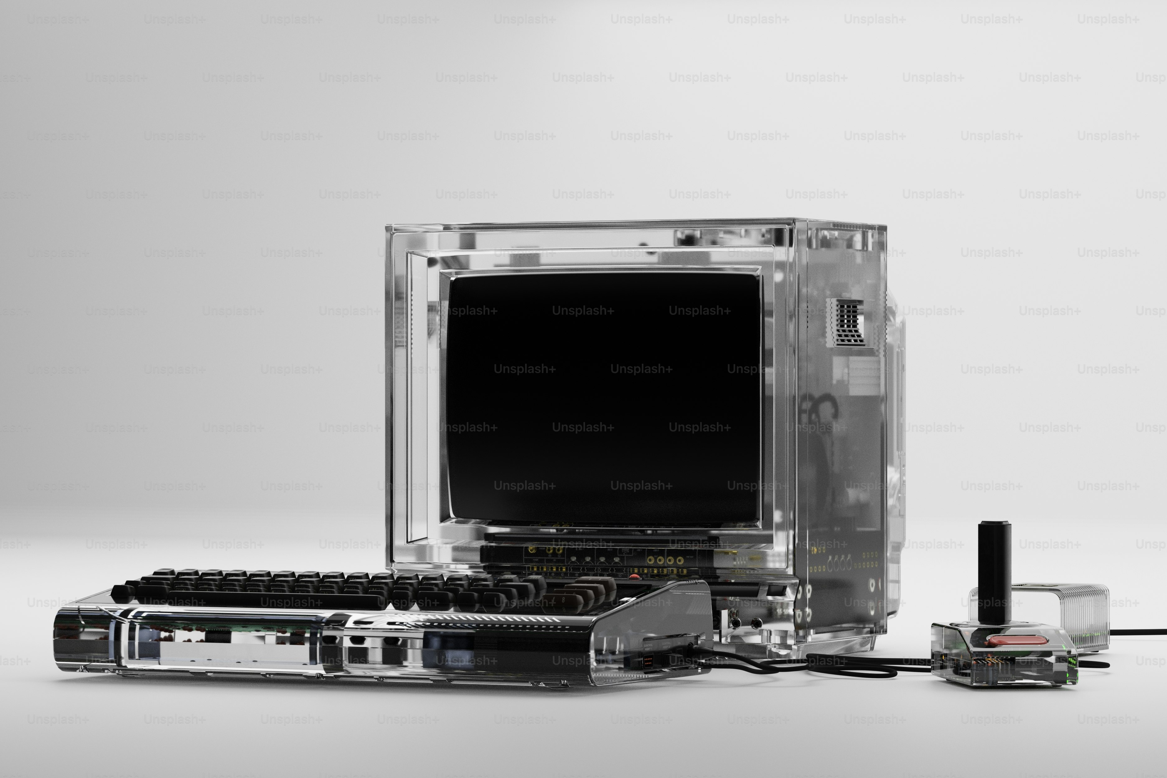 Transparent computer with keyboard and joystick photo – Technology ...