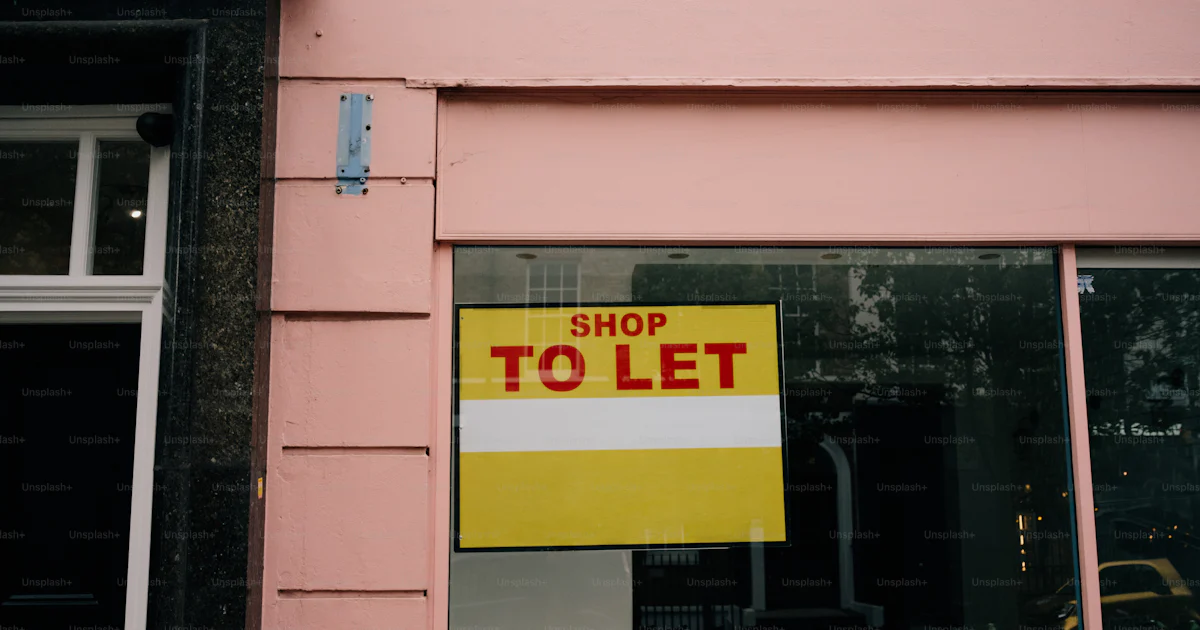 Shop to let sign on a pink storefront photo – Real estate Image on Unsplash