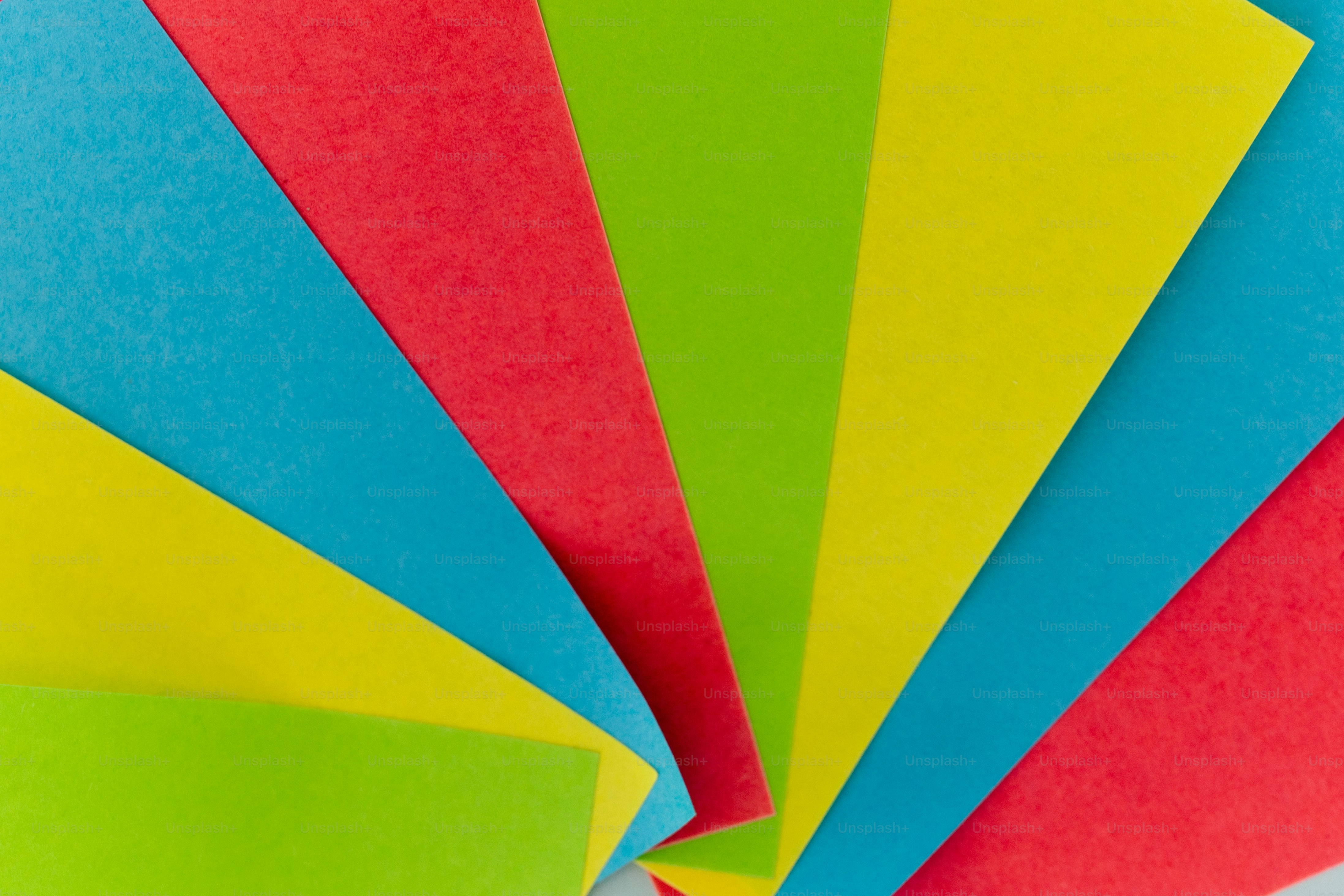 Colorful cylindrical objects arranged in a circle photo – Education ...
