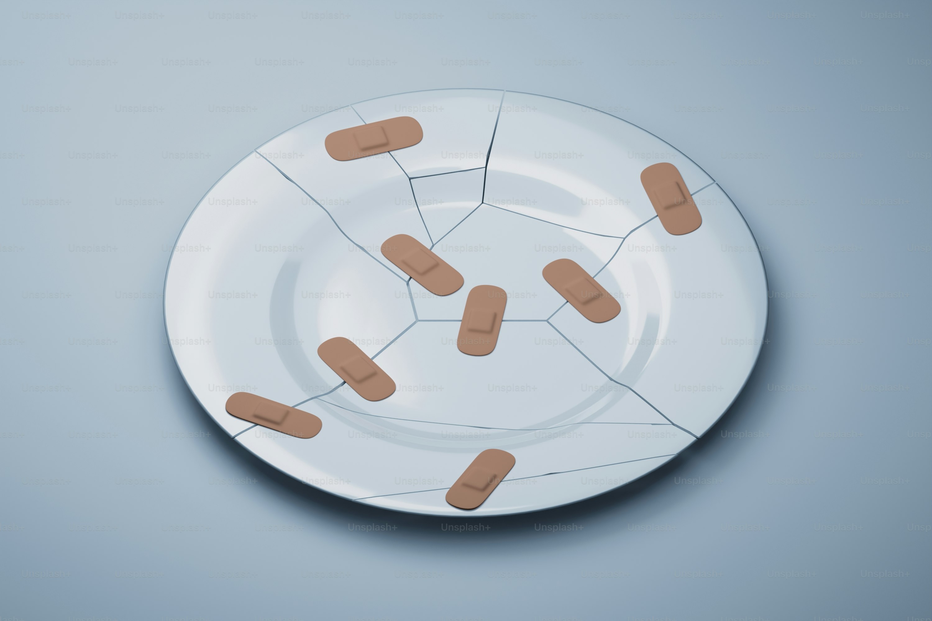 A cracked plate mended with adhesive bandages