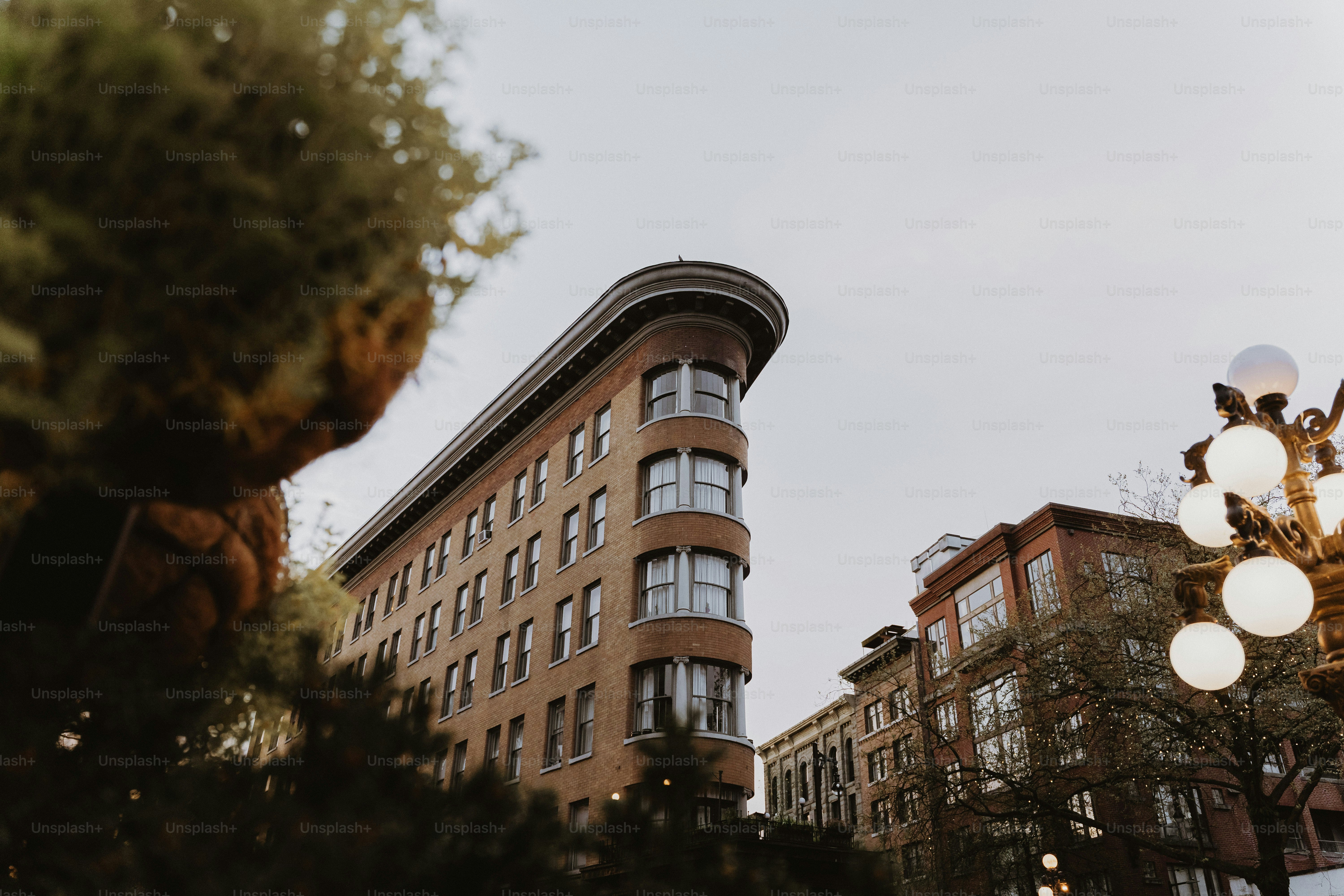 Flatiron building with trees and street lamp