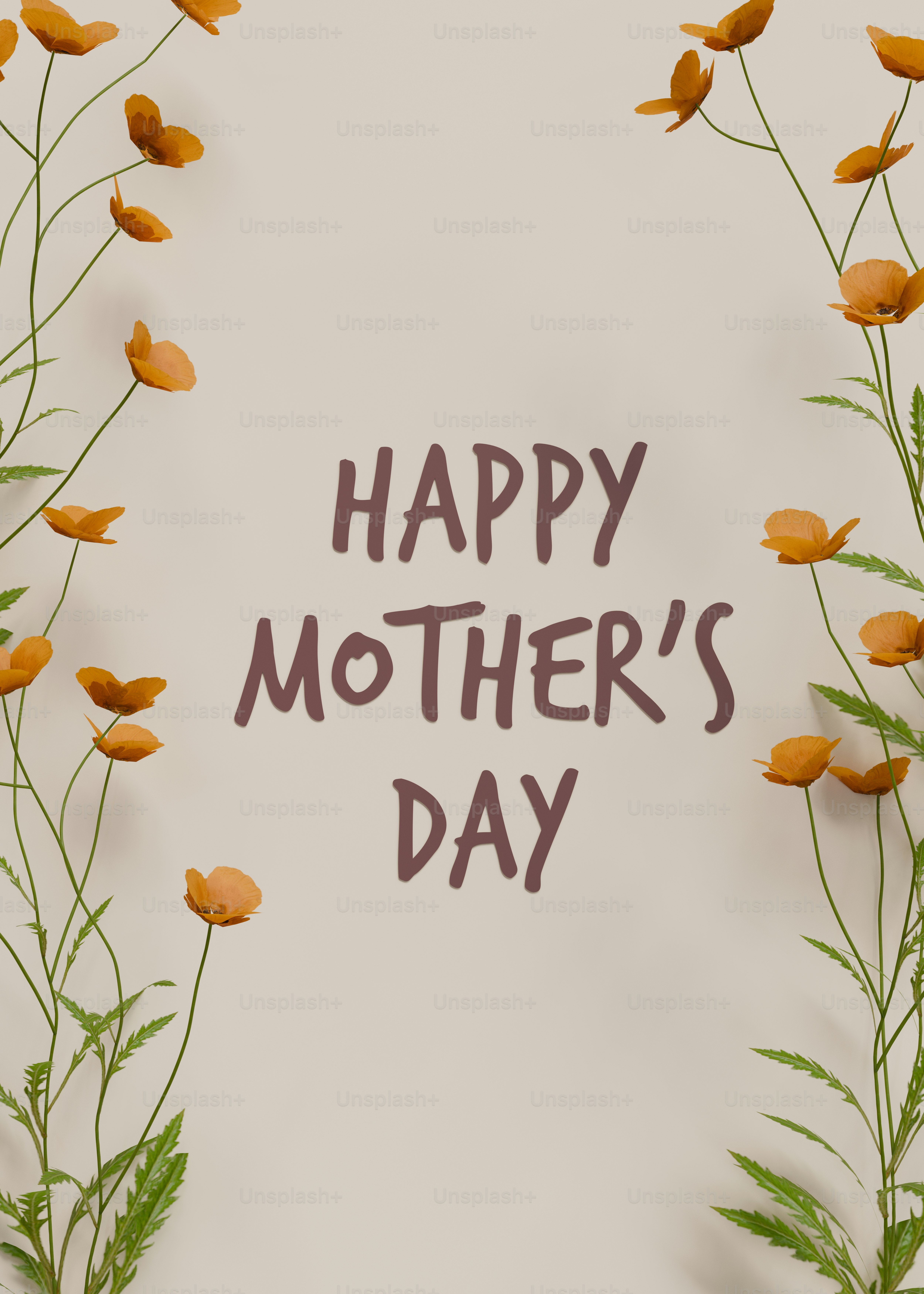 Teks selamat hari ibu dikelilingi oleh bunga