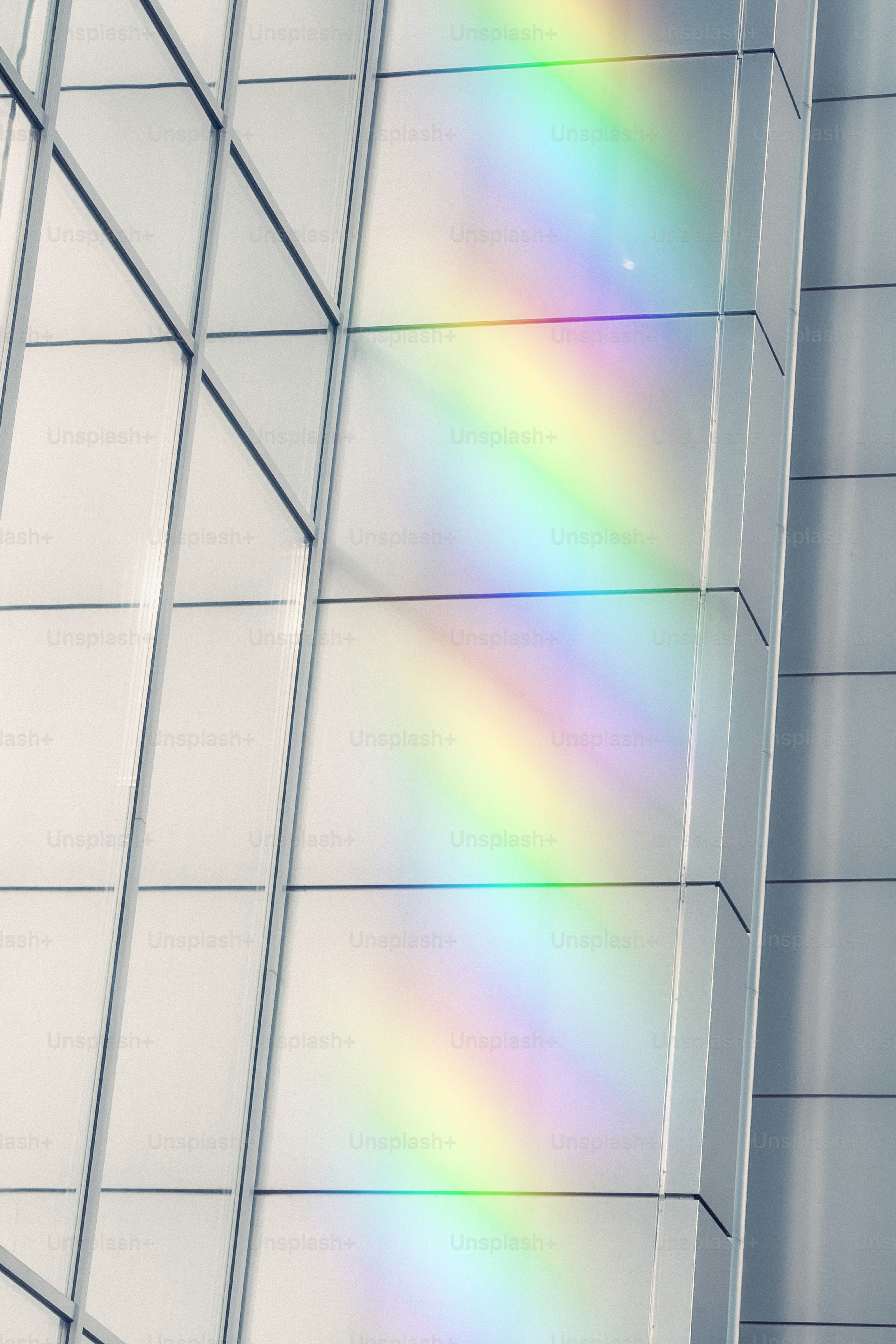 Rainbow light reflection on a modern building facade