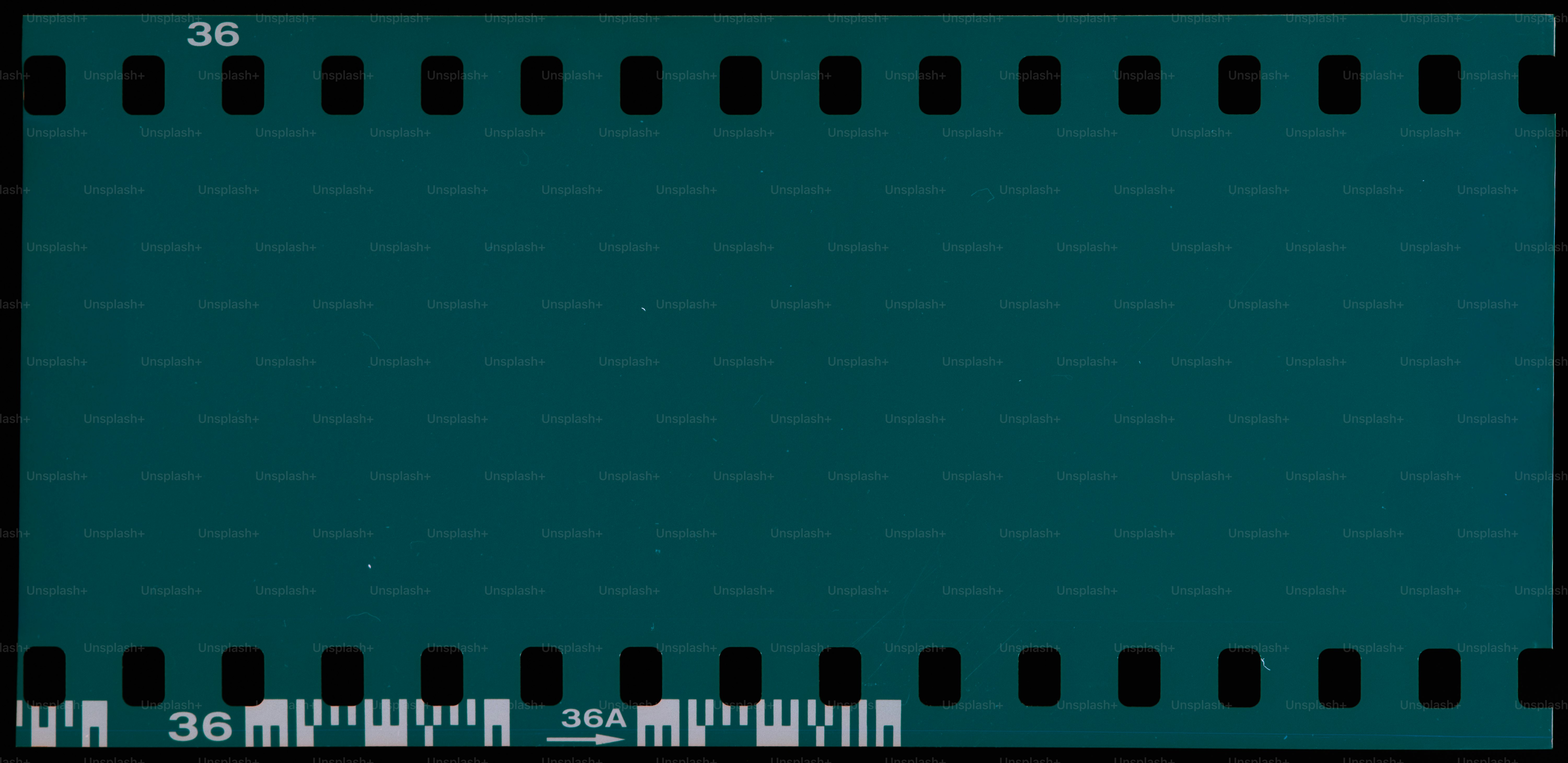 A blank film strip with perforations on the sides.