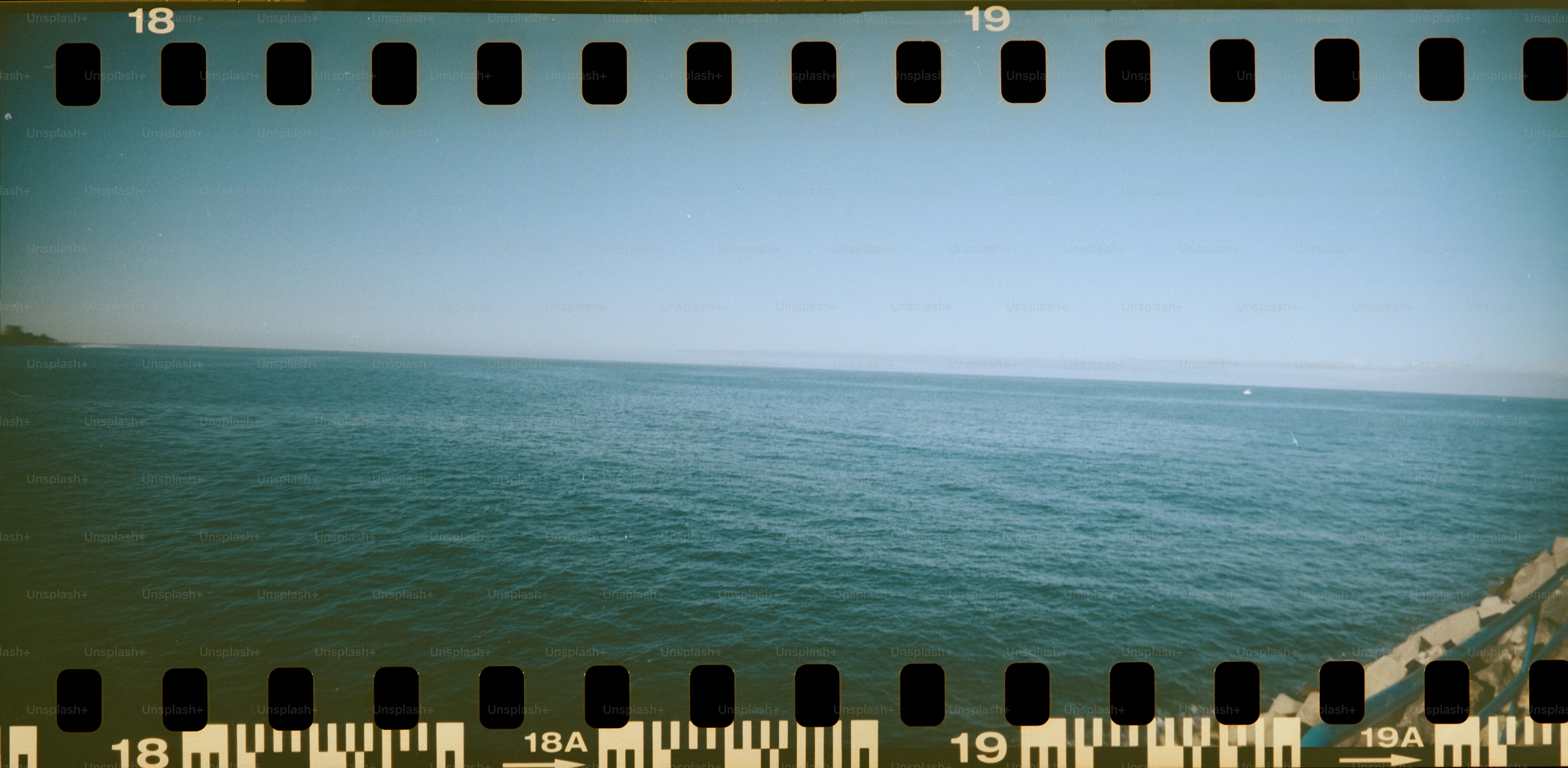 Calm blue ocean under a clear sky
