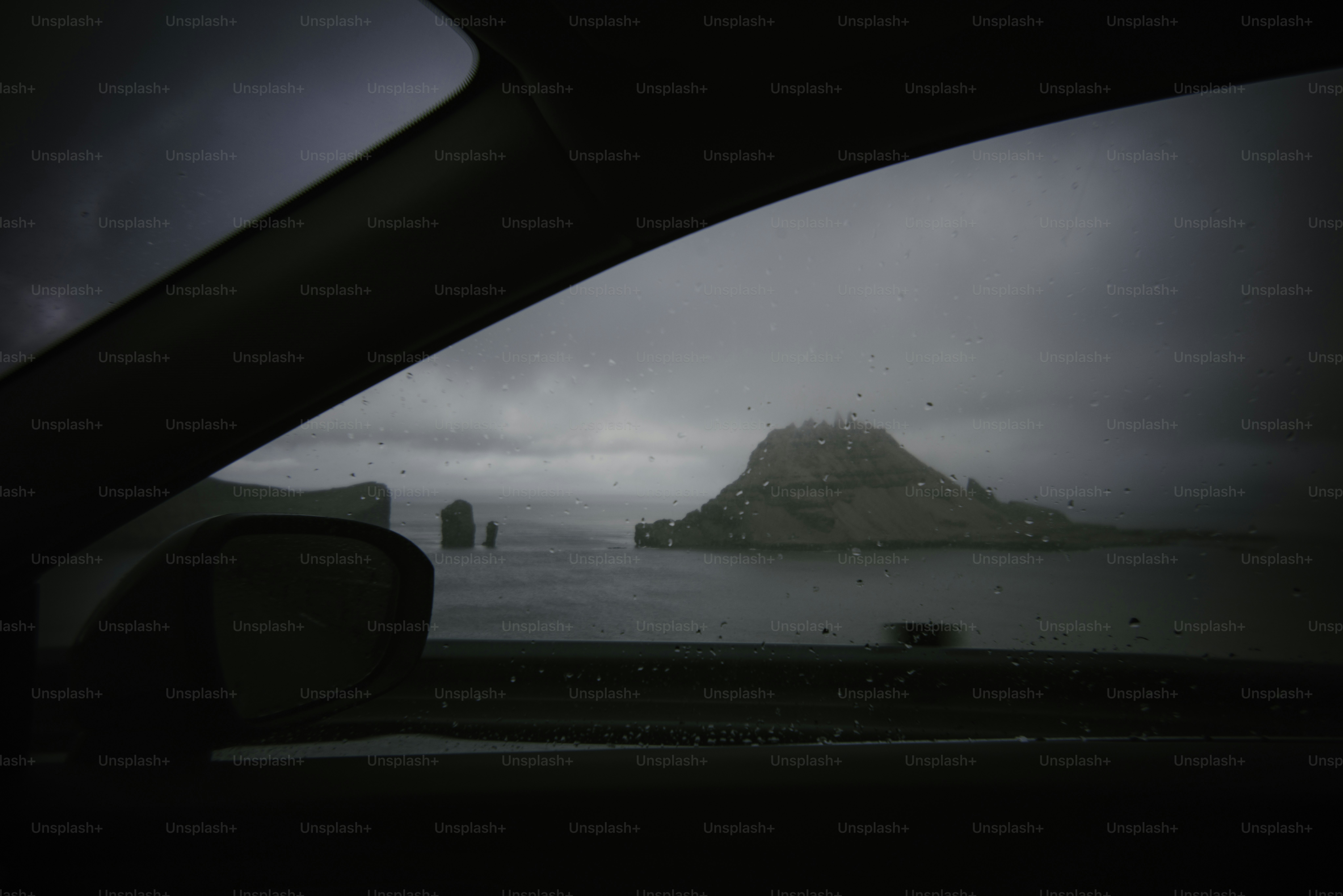 View of a rocky island from a car window