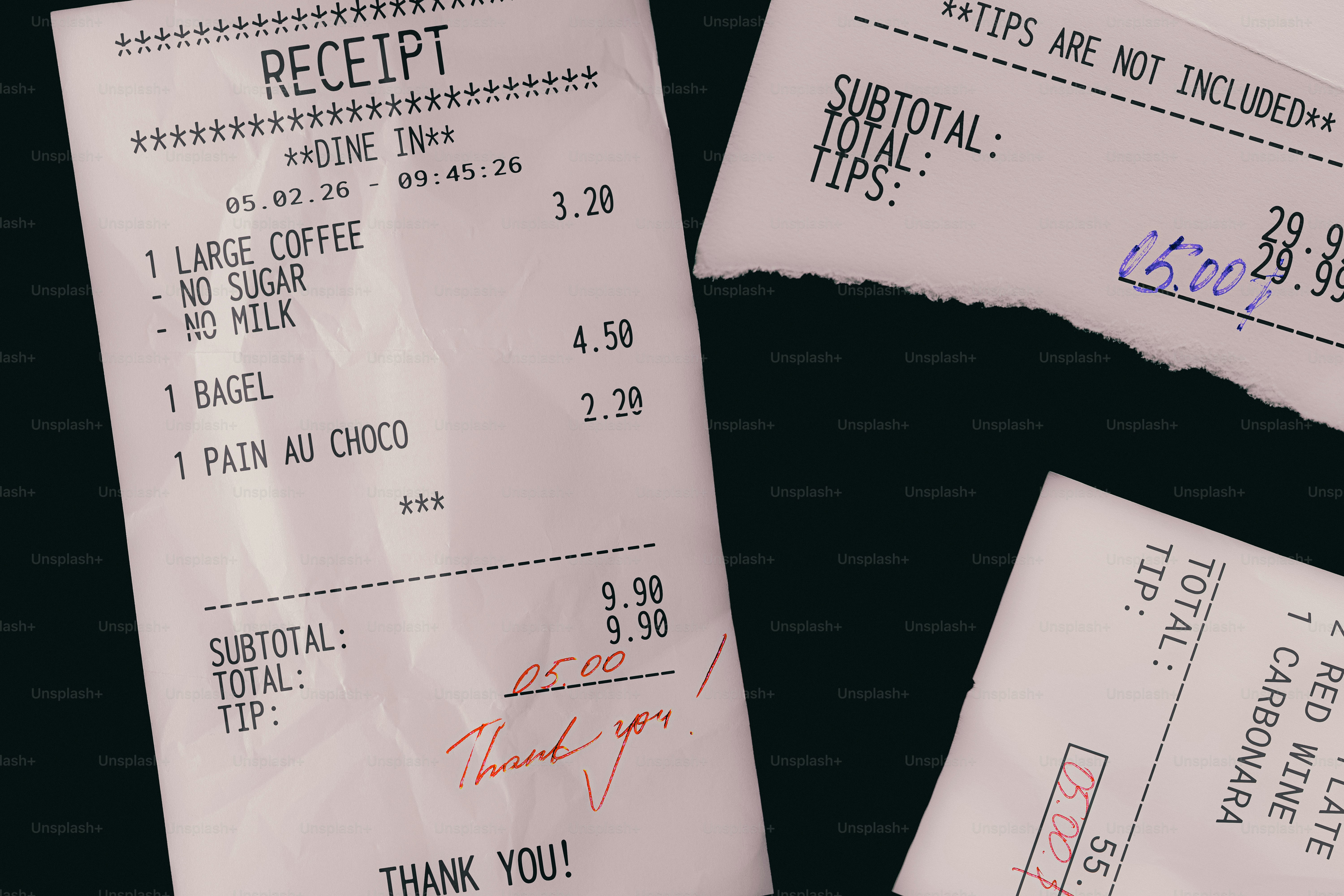 Several restaurant receipts with handwritten notes.