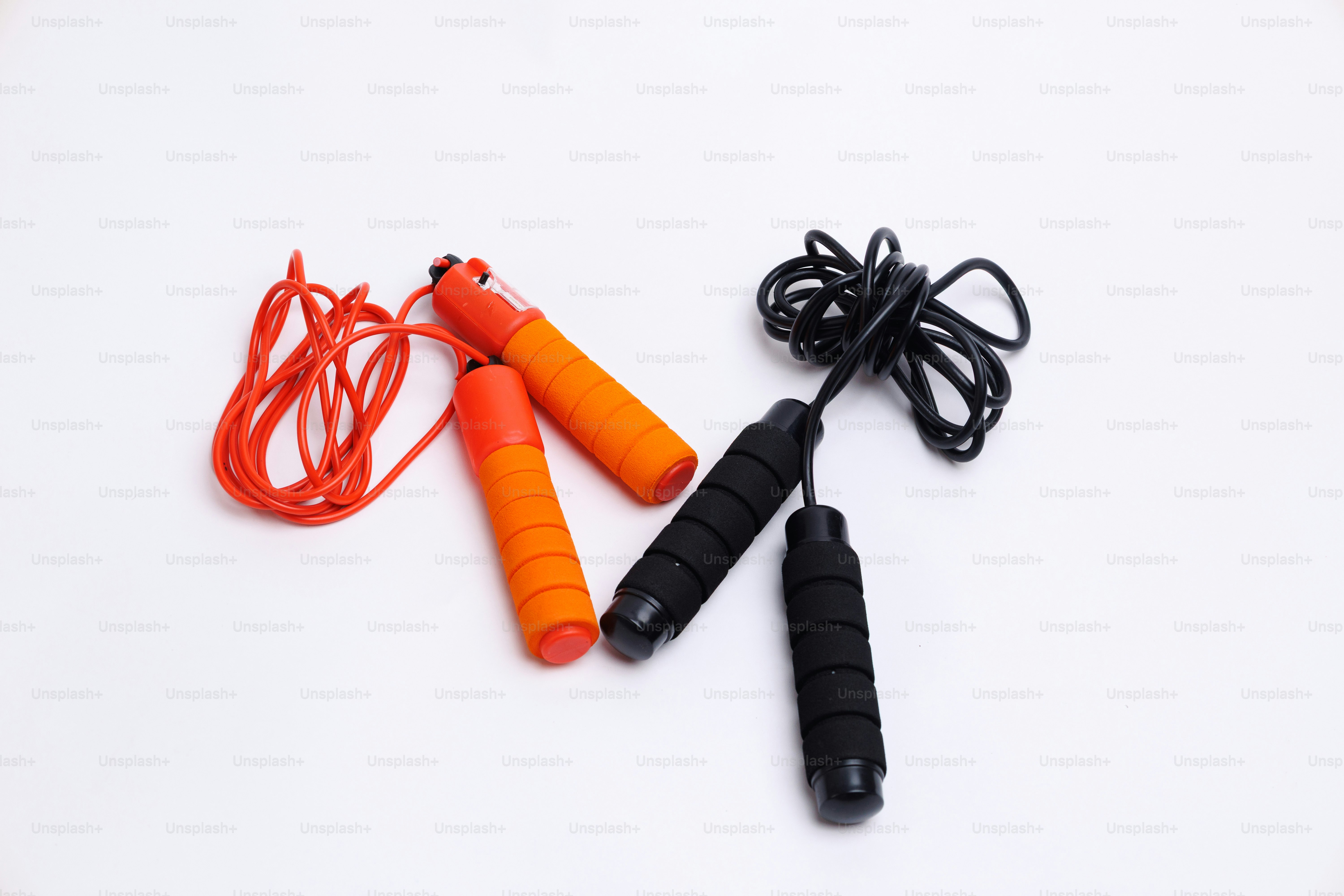Two jump ropes on a white background