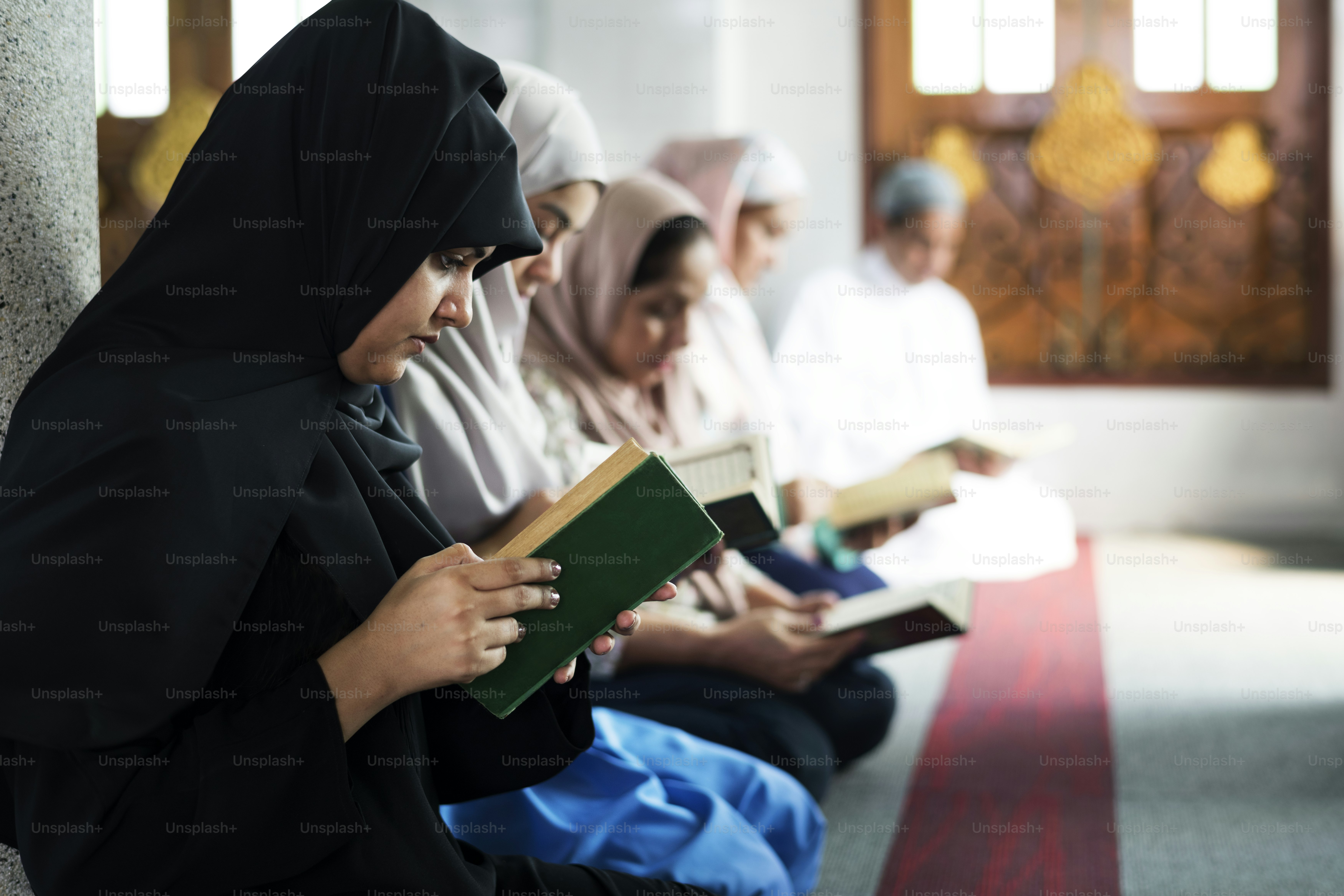 Muslims reading from the quran