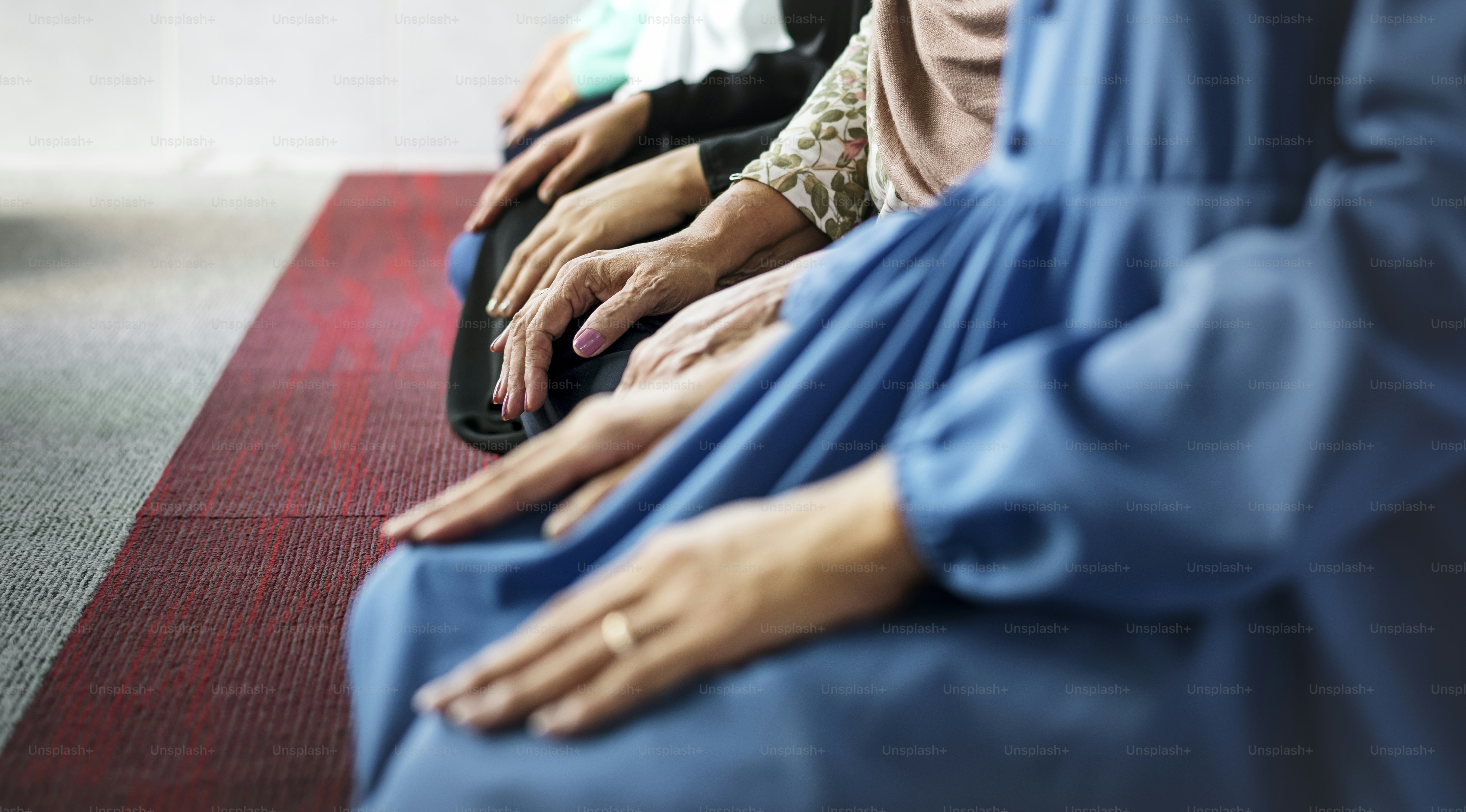Muslim praying in Tashahhud posture