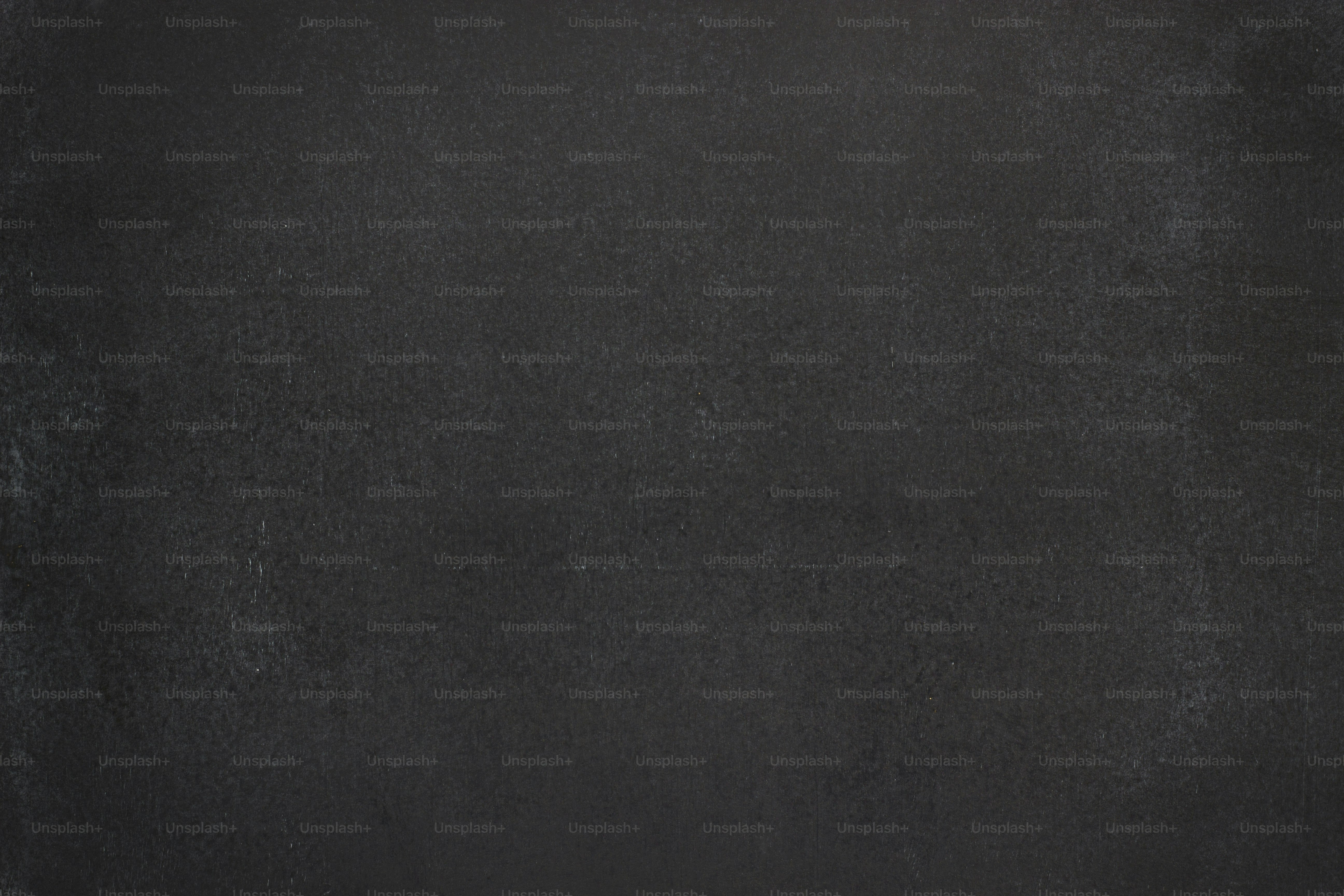 chalk rubbed on  chalkboard. abstract blackboard background for text