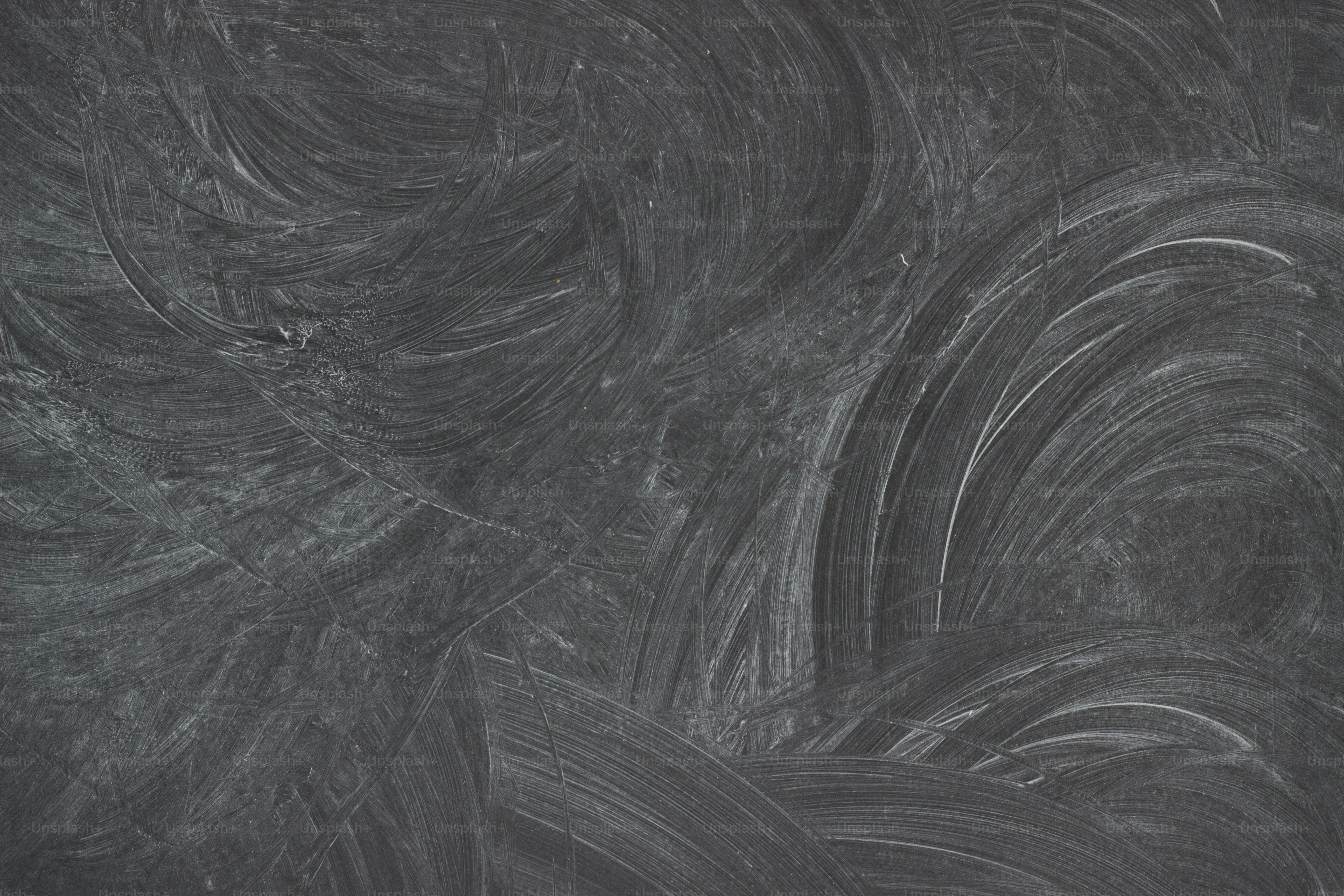 Black chalkboard background. texture blackboard with chalk traces