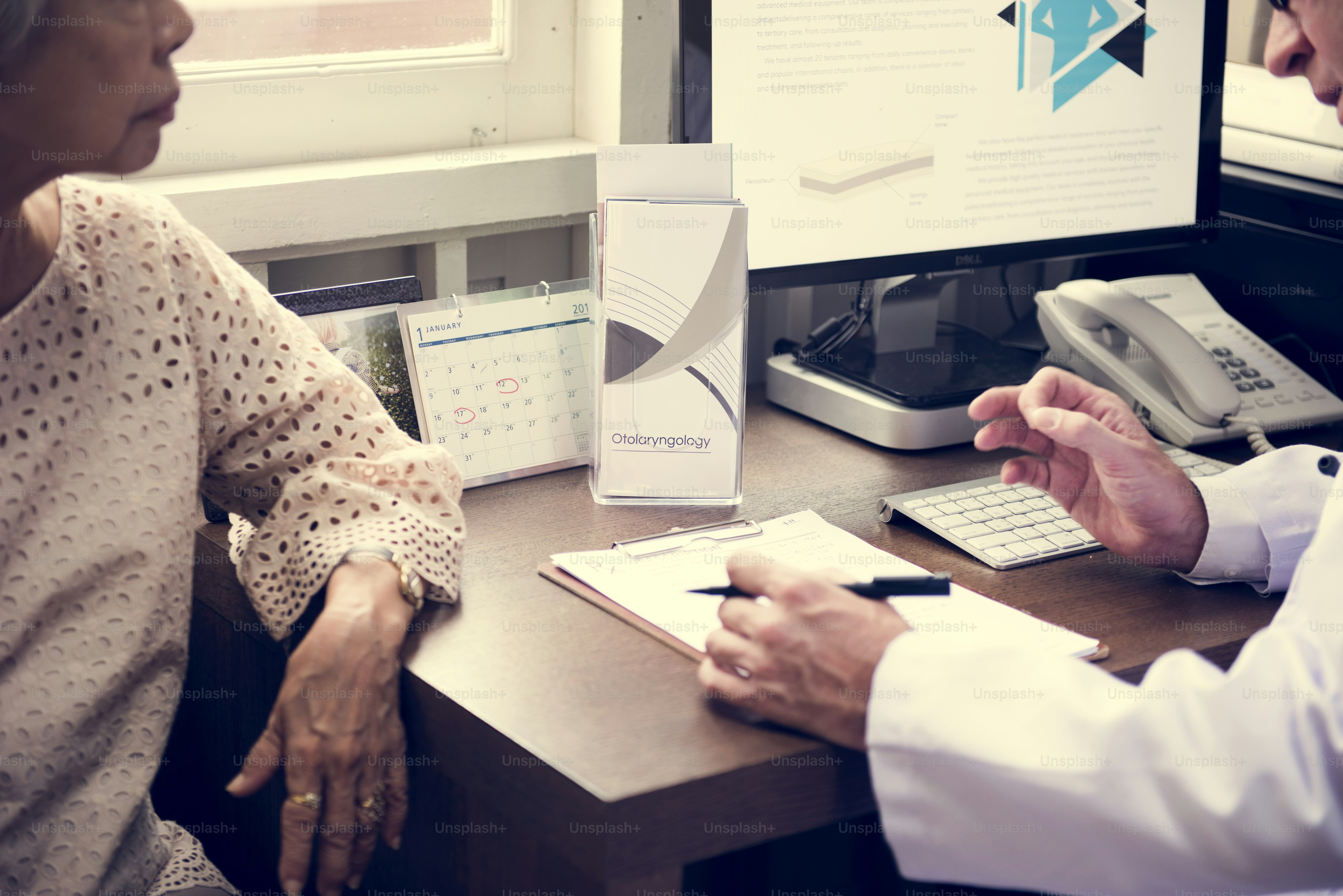 An elderly patient meeting doctor at the hospital***These documents are our own generic designs. They do not infringe on any copyrighted designs.
