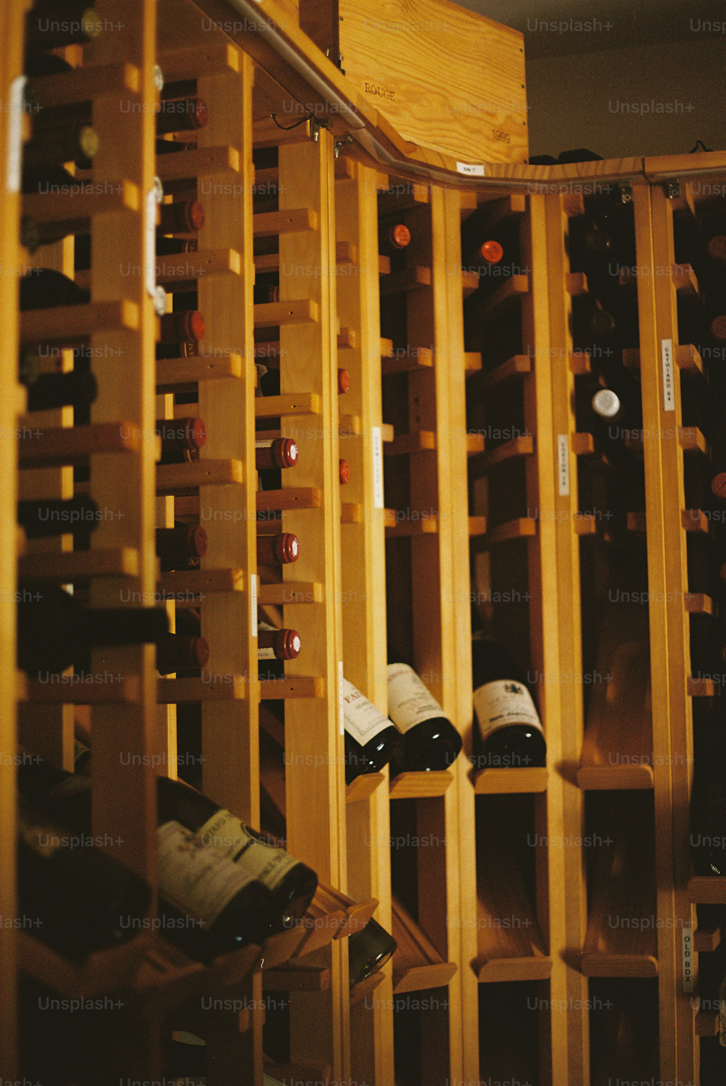 Wooden wine rack filled with bottles