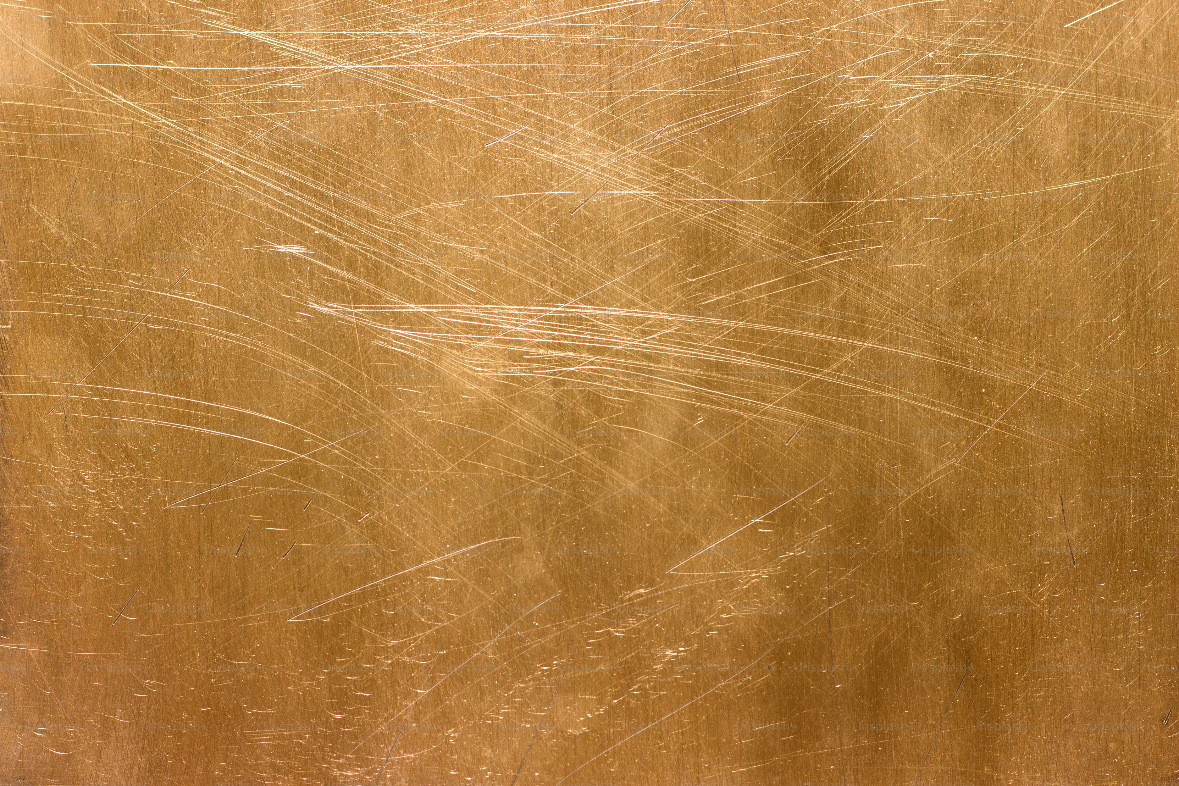Gold plate, texture of golden metal, background