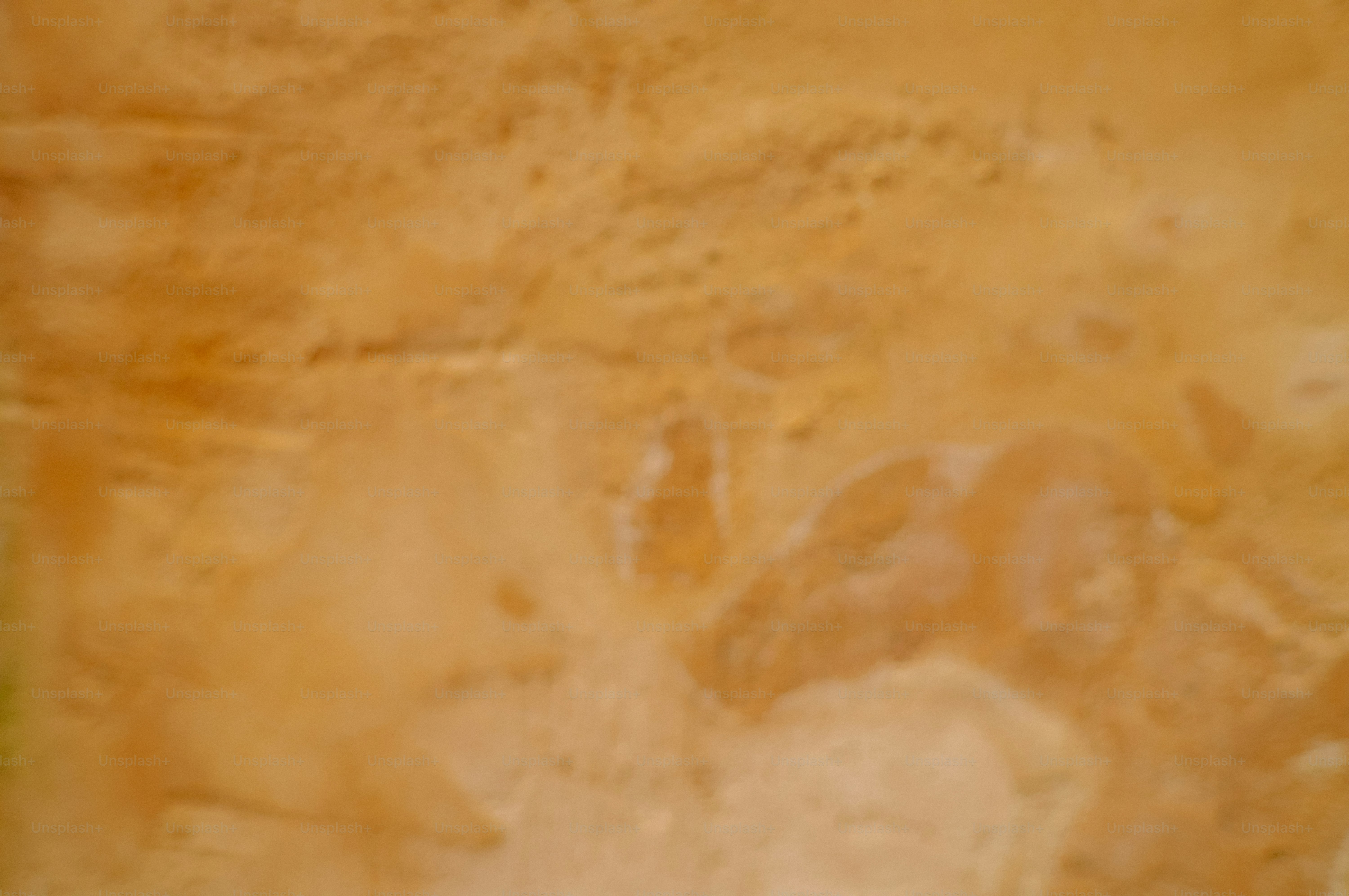 Close up of textured beige and orange abstract background