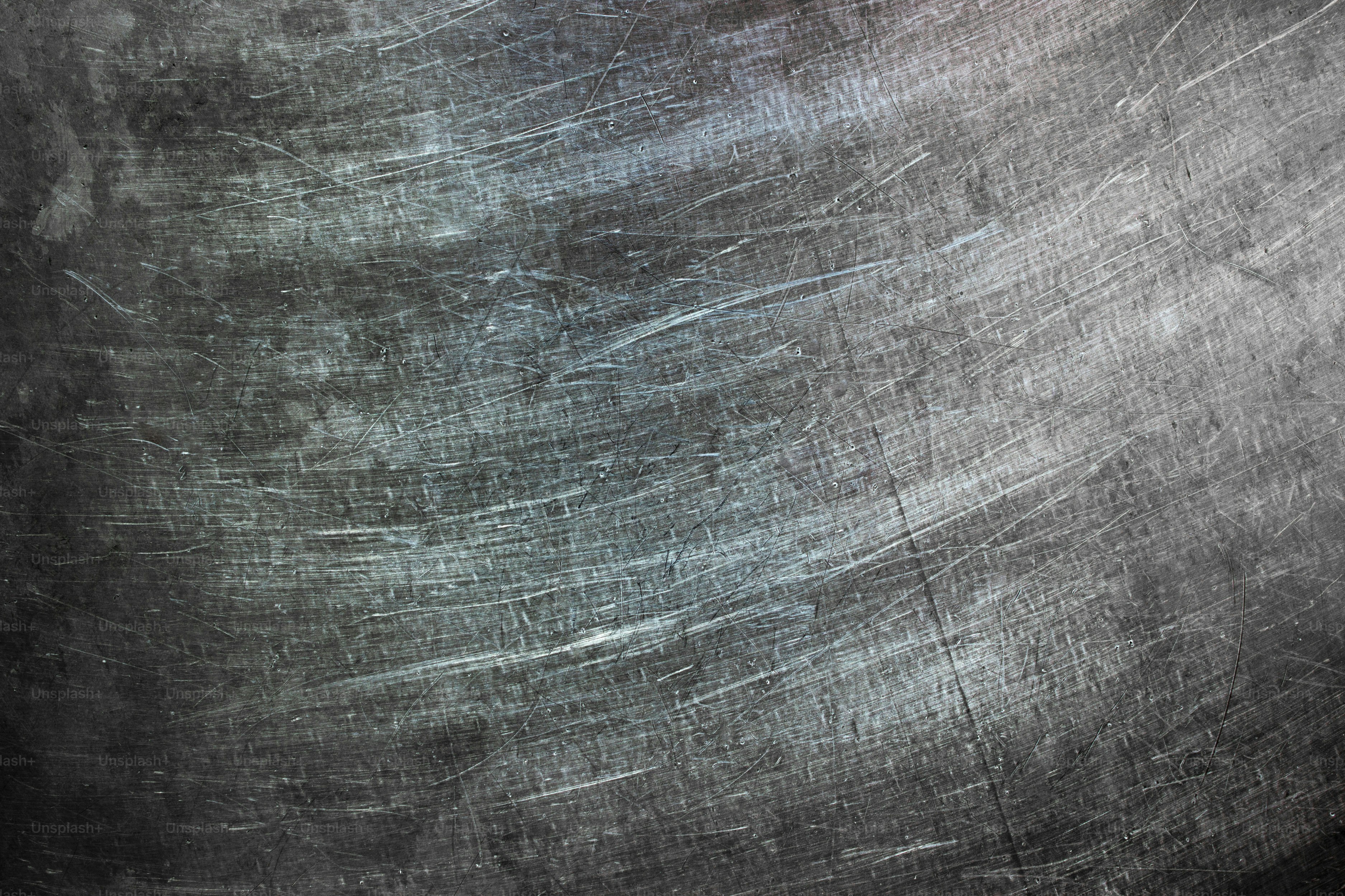 Steel texture, dark background brushed iron close-up