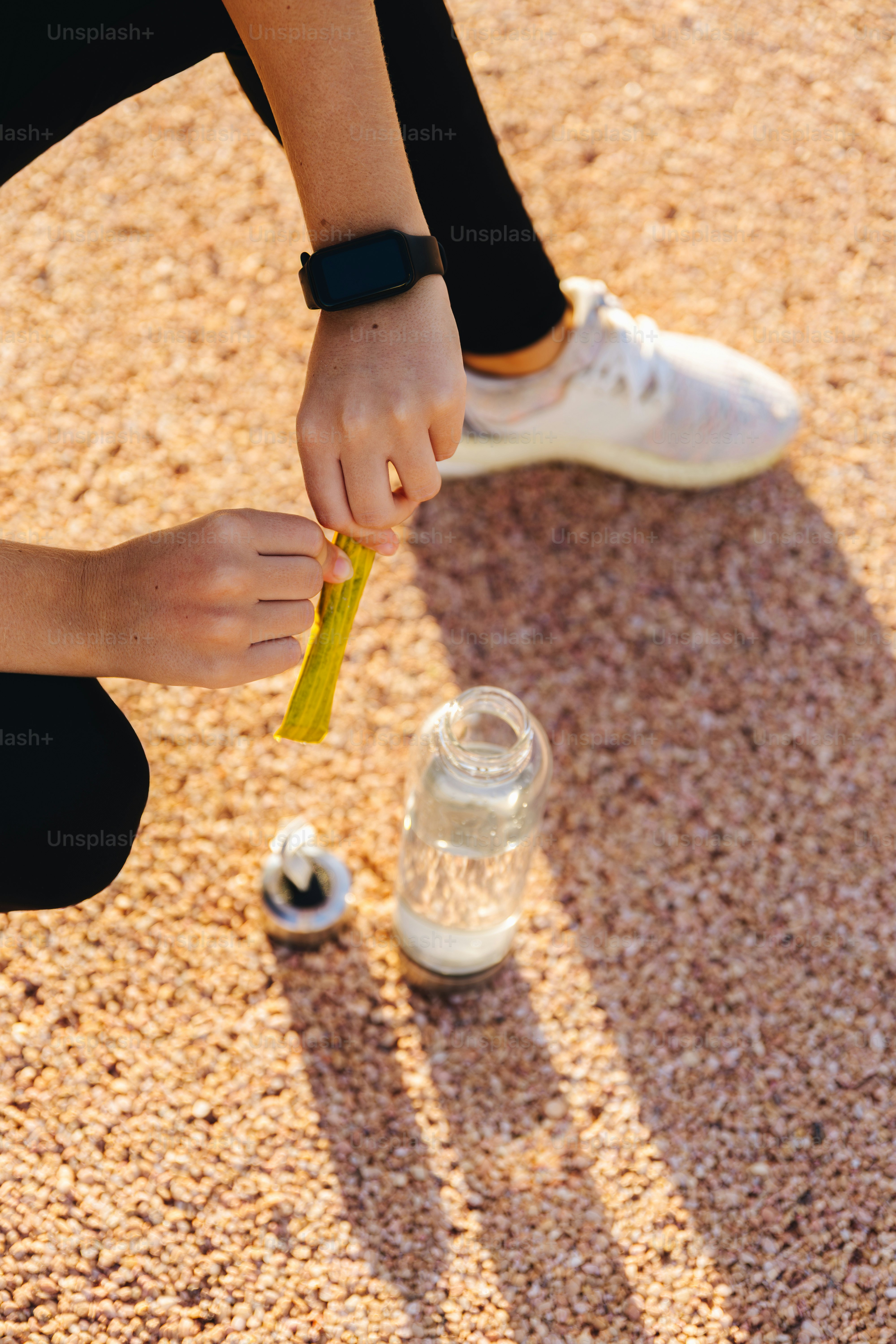 Mixing a sports drink with a water bottle