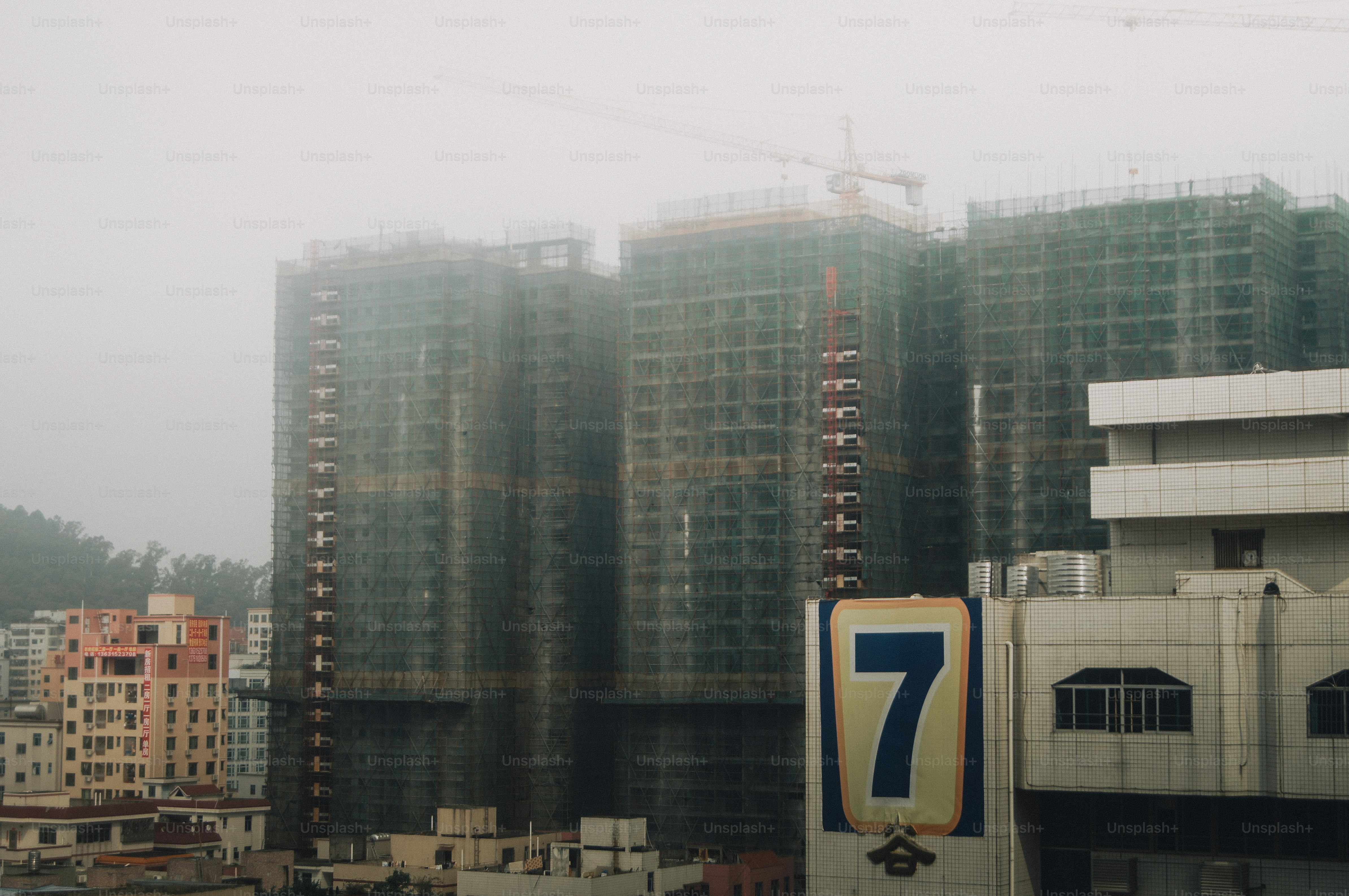 Hazy urban construction site with a large blue