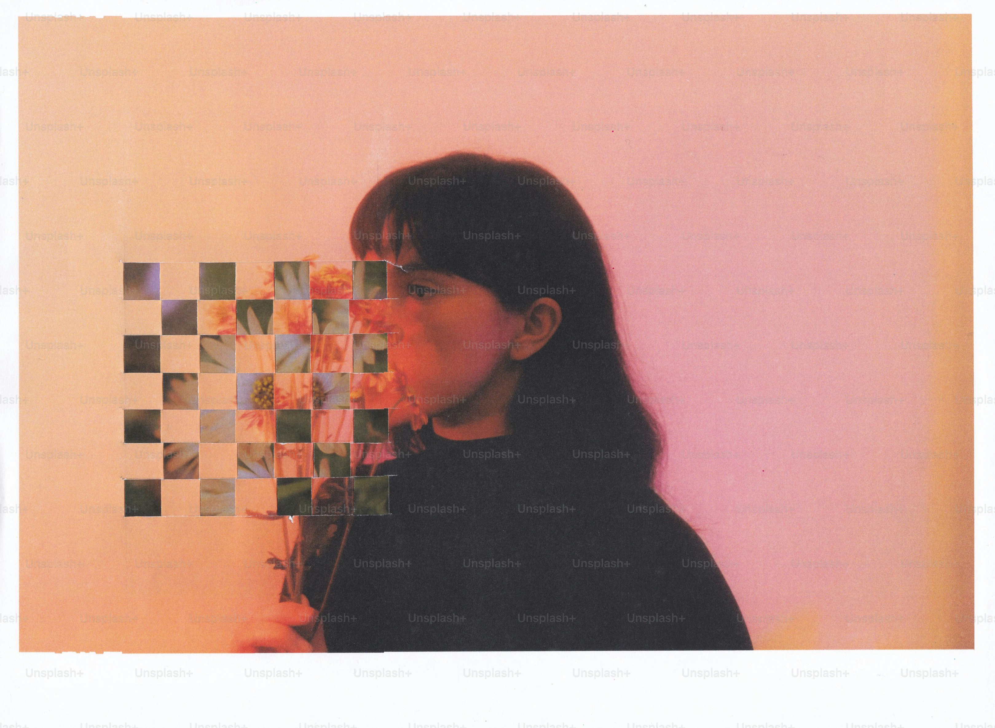 Woman's face obscured by a checkered floral pattern.
