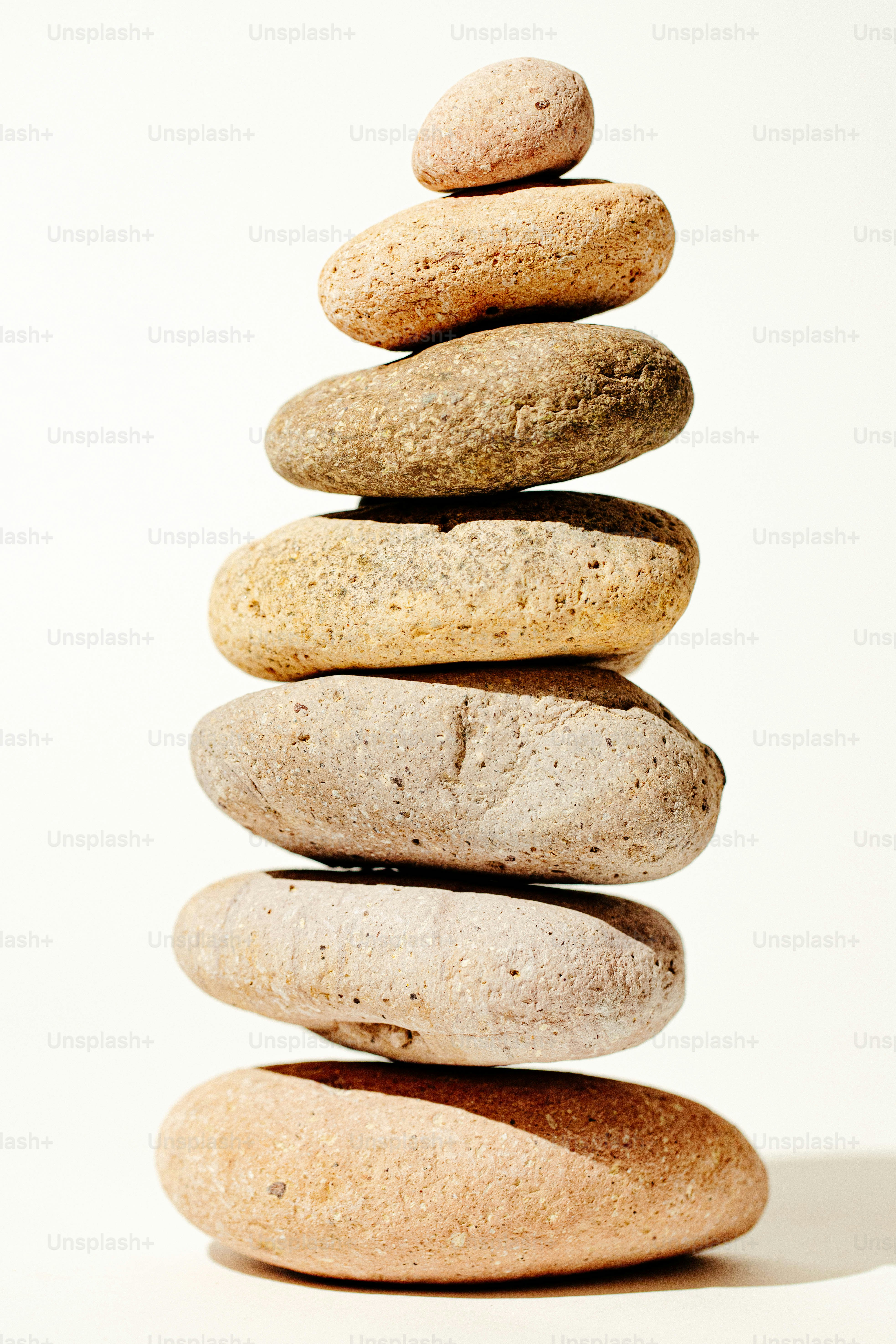 Seven smooth, natural stones balanced in a stack. photo – Meditation ...