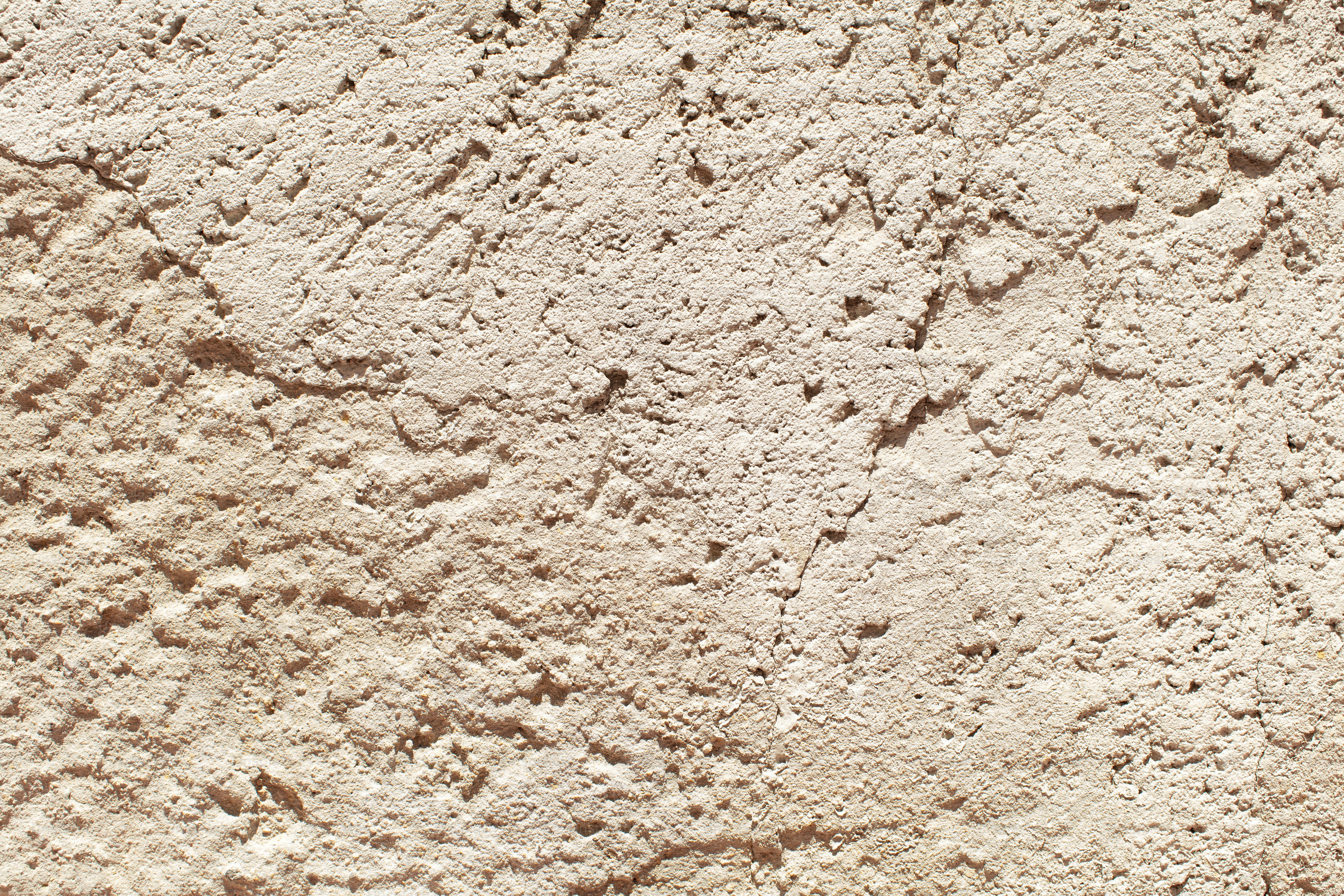 Fond de surface murale rugueuse et texturée marron clair